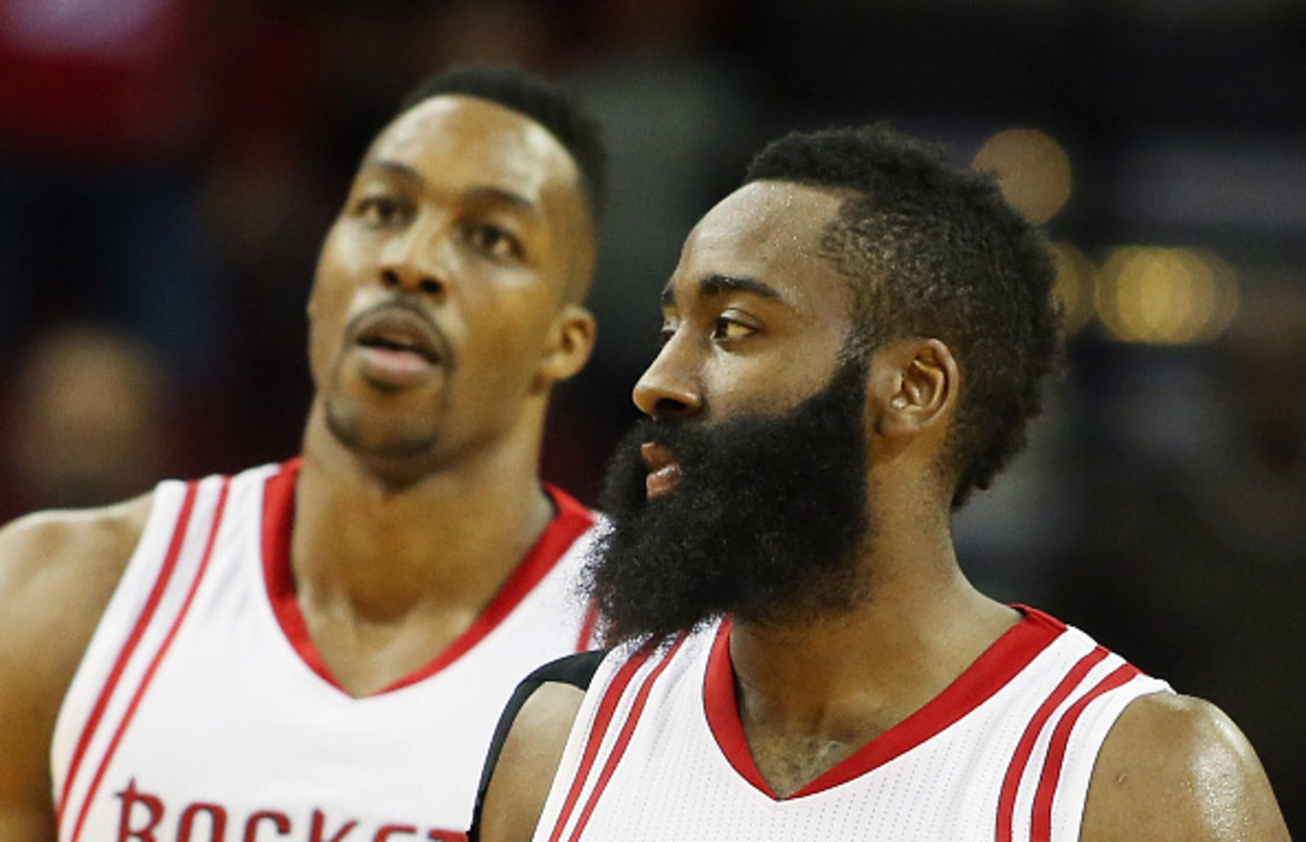 HOUSTON, TX - NOVEMBER 27:  Dwight Howard #12 and James Harden #13 of the Houston Rockets walk up the court during their game against the Philadelphia 76ers at the Toyota Center on November 27, 2015 in Houston, Texas.  (Photo by Scott Halleran/Getty Image