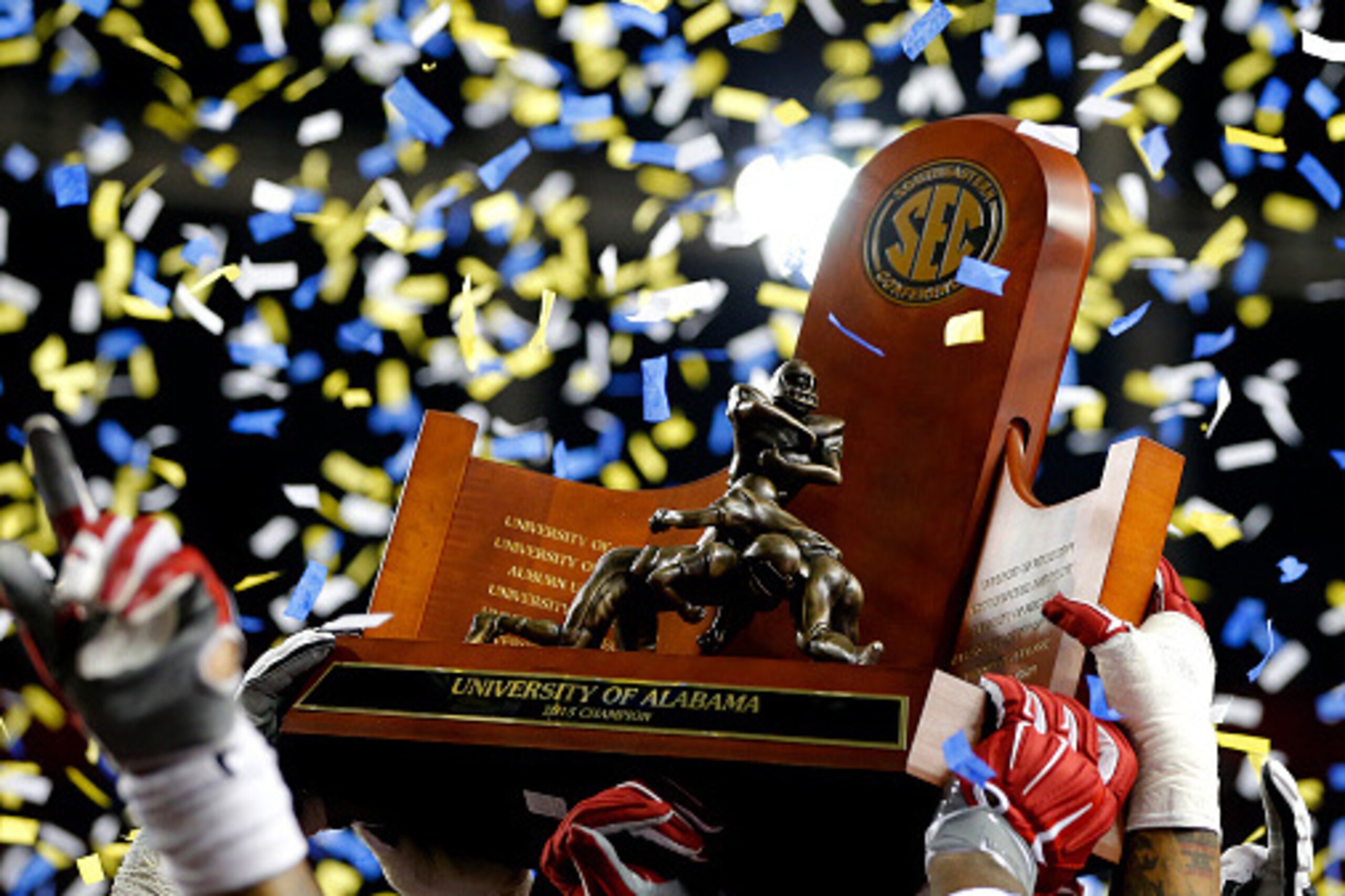 The road to winning a trophy like this often begins with beating out other coaches and teams for top-notch recruits.