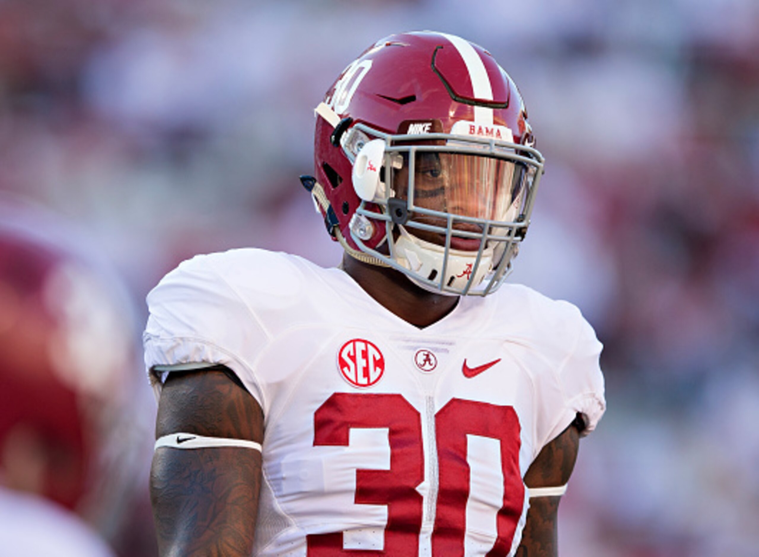 FAYETTEVILLE, AR - OCTOBER 8:  Mack Wilson #30 of the Alabama Crimson Tide warming up before a game against the Arkansas Razorbacks at Razorback Stadium on October 8, 2016 in Fayetteville, Arkansas.  The Crimson Tide defeated the Razorbacks 49-30.  (Photo