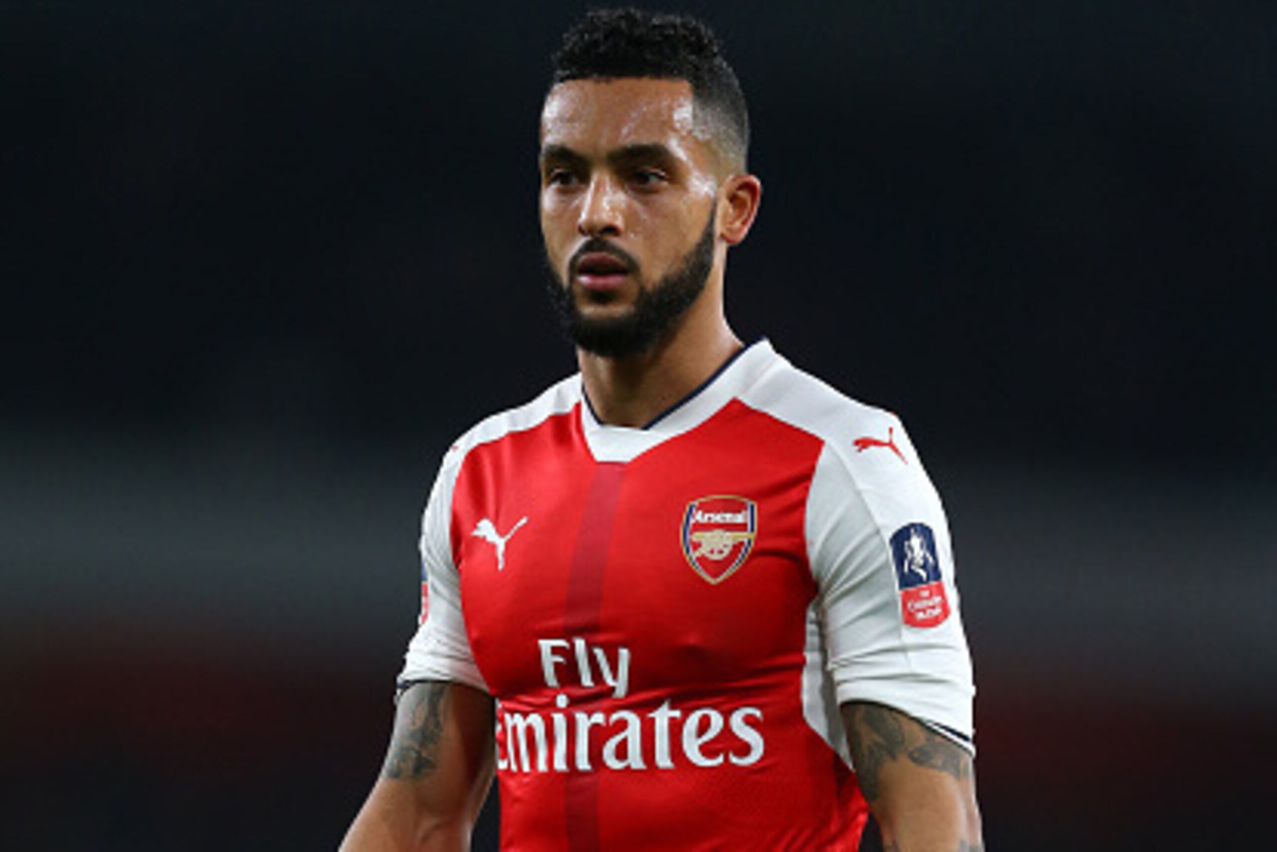 Theo Walcott reached 100 Arsenal goals against Sutton United.