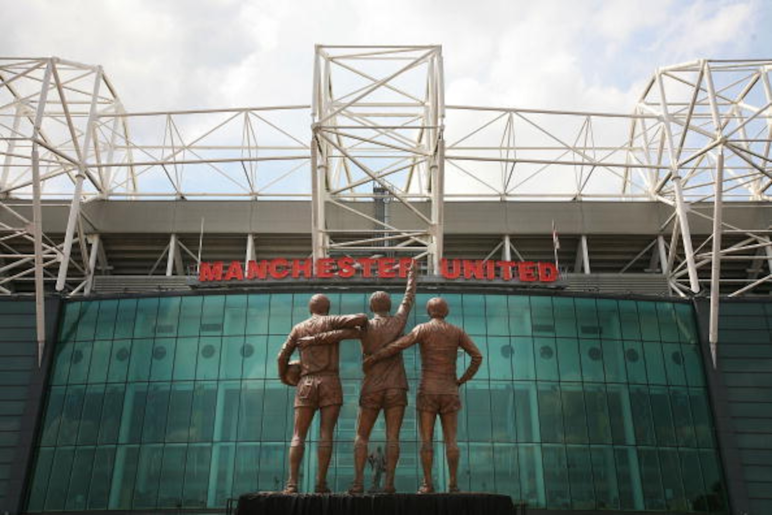The Holy Trinity: Best, Law and Charlton commemorated in statue outside Old Trafford. The Holy Trinity: Best, Law and Charlton commemorated in statue outside Old Trafford.