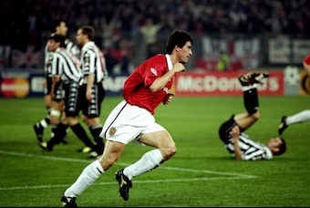 Roy Keane celebrates his goal in the Champions League semi-final.
