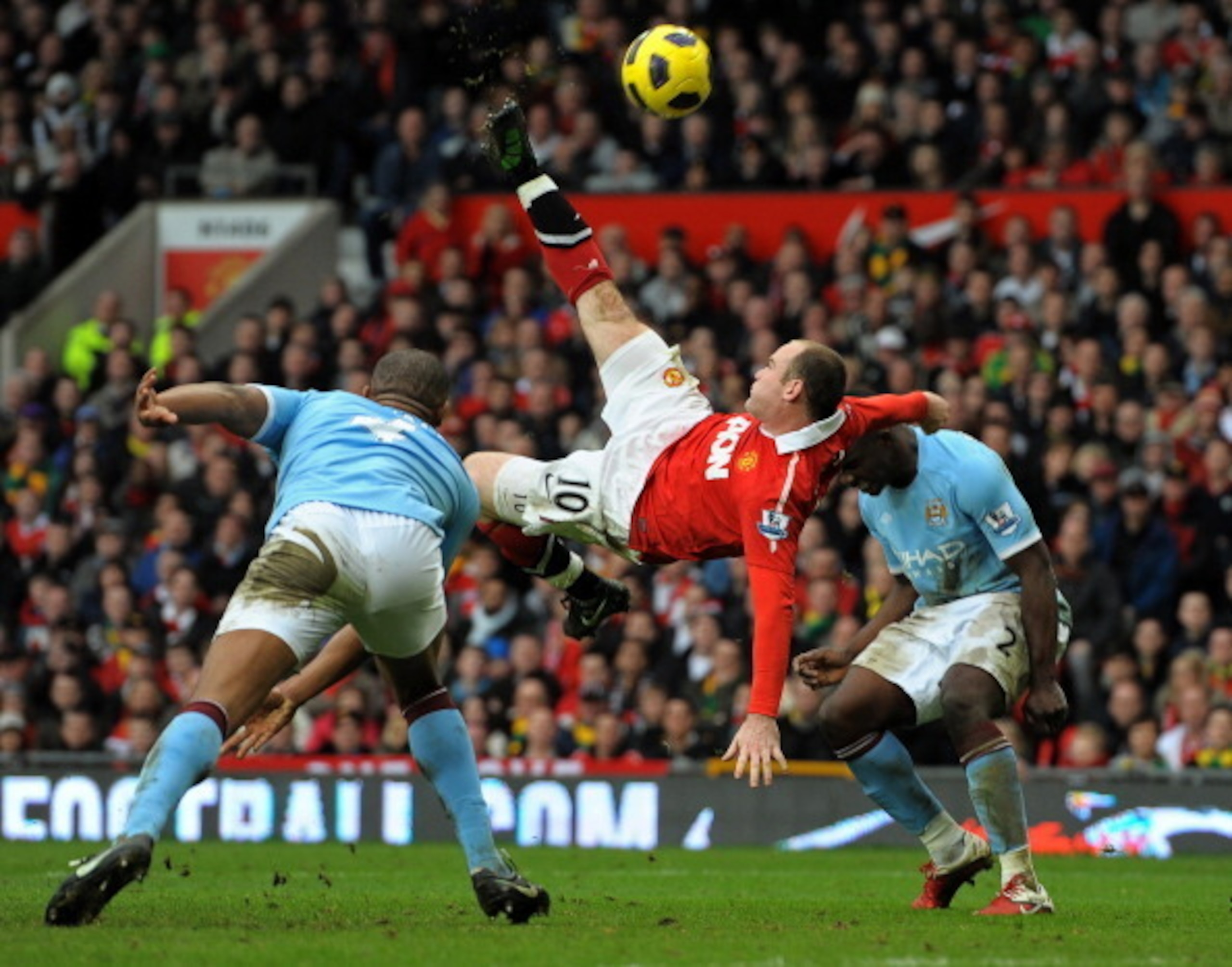 Rooney scores an iconic overhead kick against Manchester City. Rooney scores an iconic overhead kick against Manchester City.