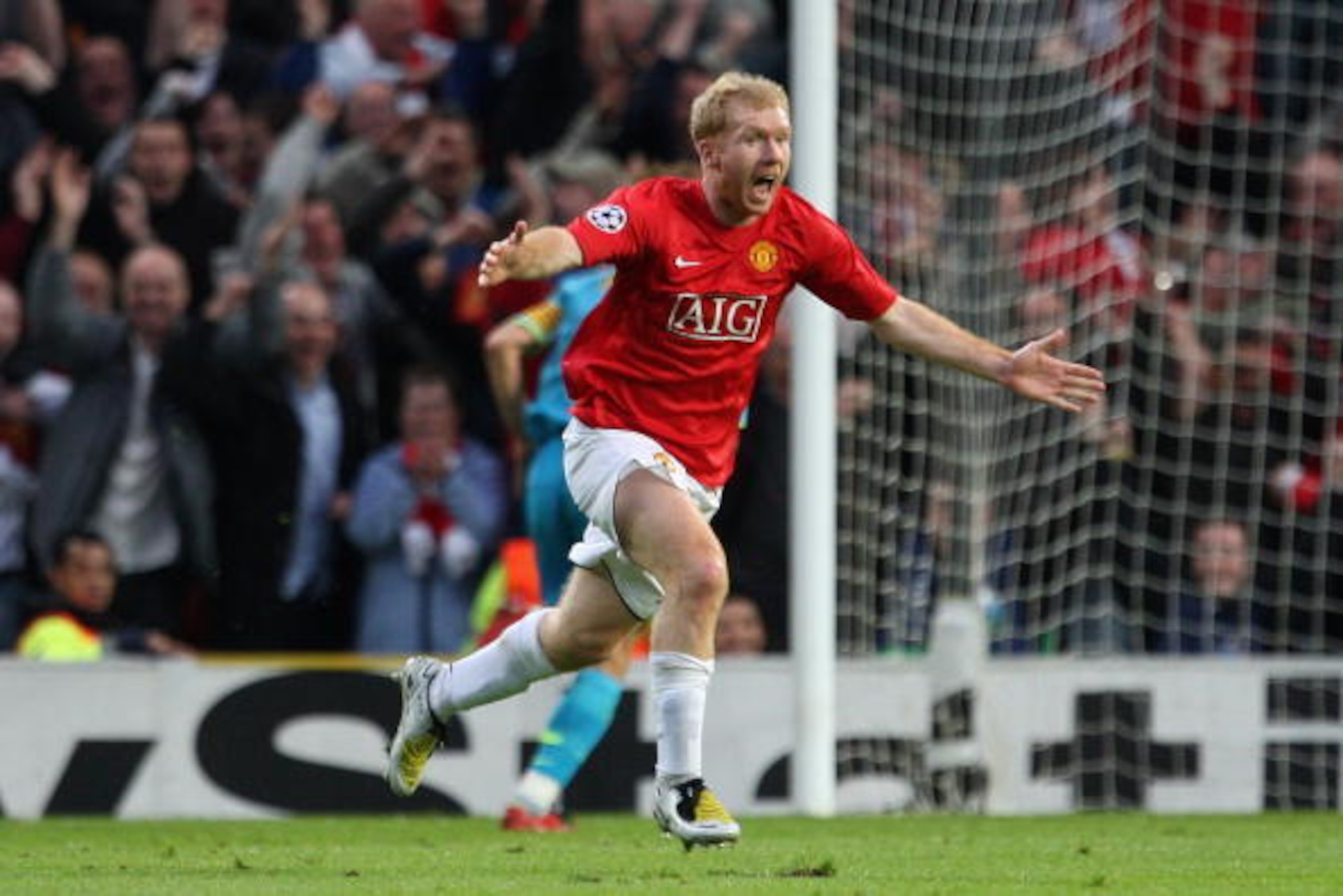 Scholes is overcome after his goal against Barcelona. Scholes is overcome after his goal against Barcelona.