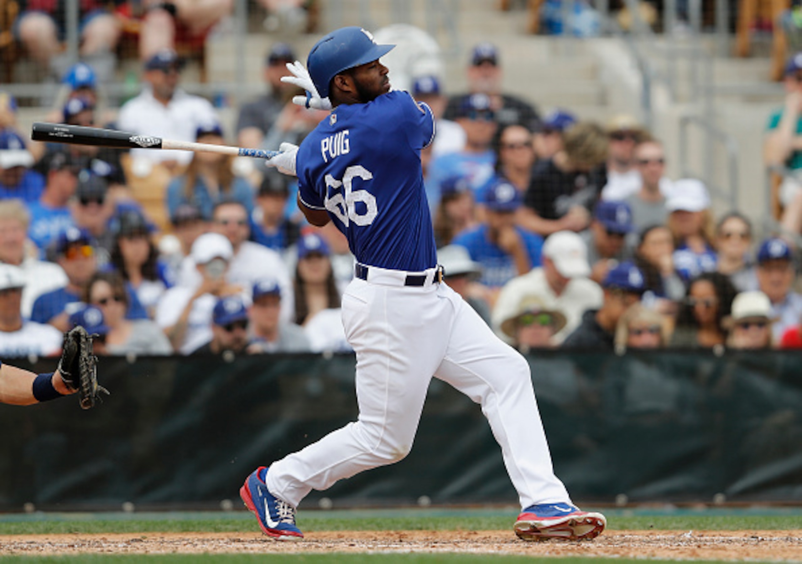 Yasiel Puig is part of a crowded competition to crack the Dodgers outfield. Yasiel Puig is part of a crowded competition to crack the Dodgers outfield.