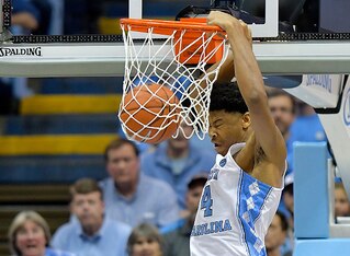 North Carolina needs Isaiah Hicks dunking balls instead of drawing calls.