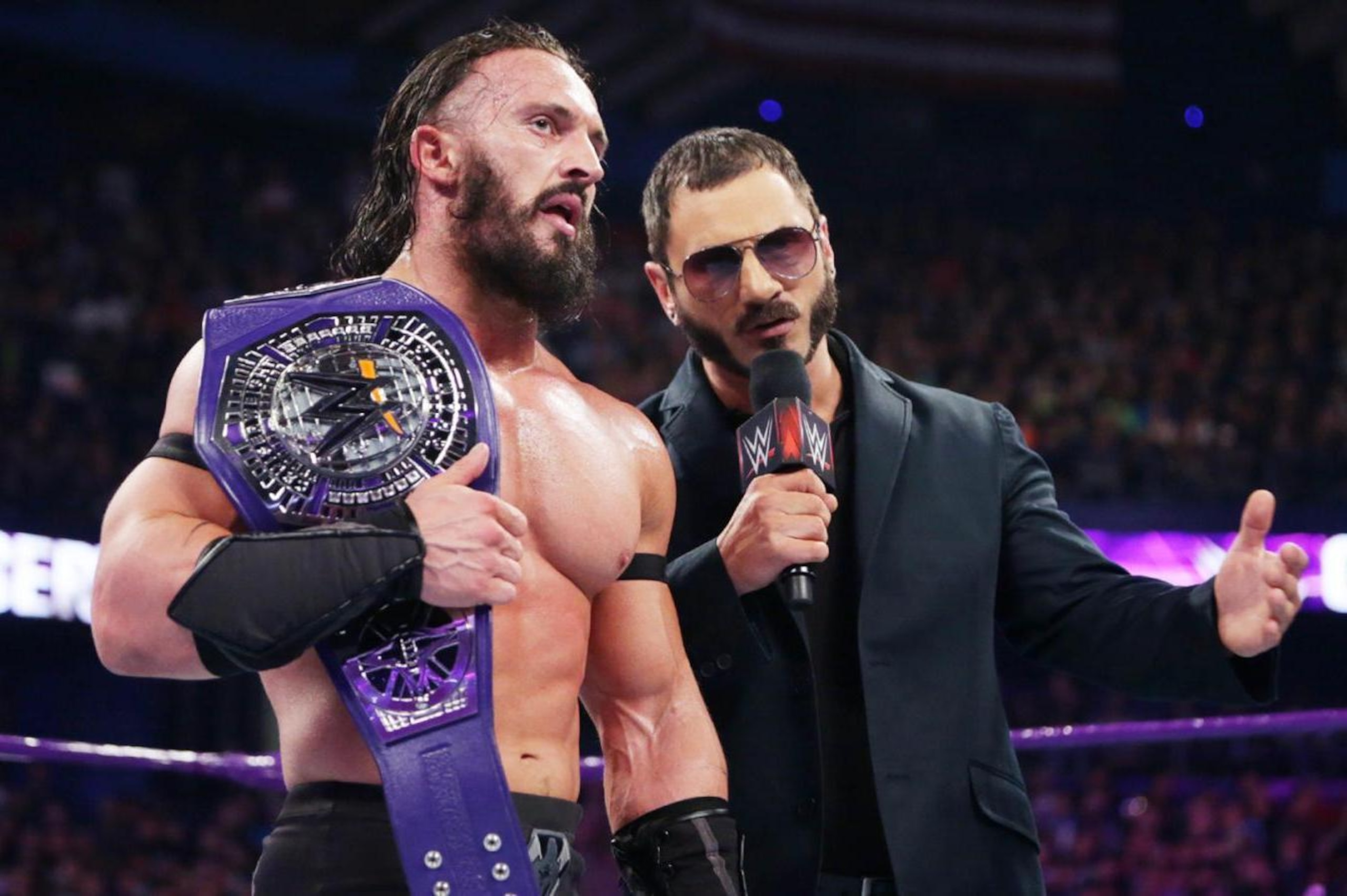 Austin Aries and Neville moments before things got physical.