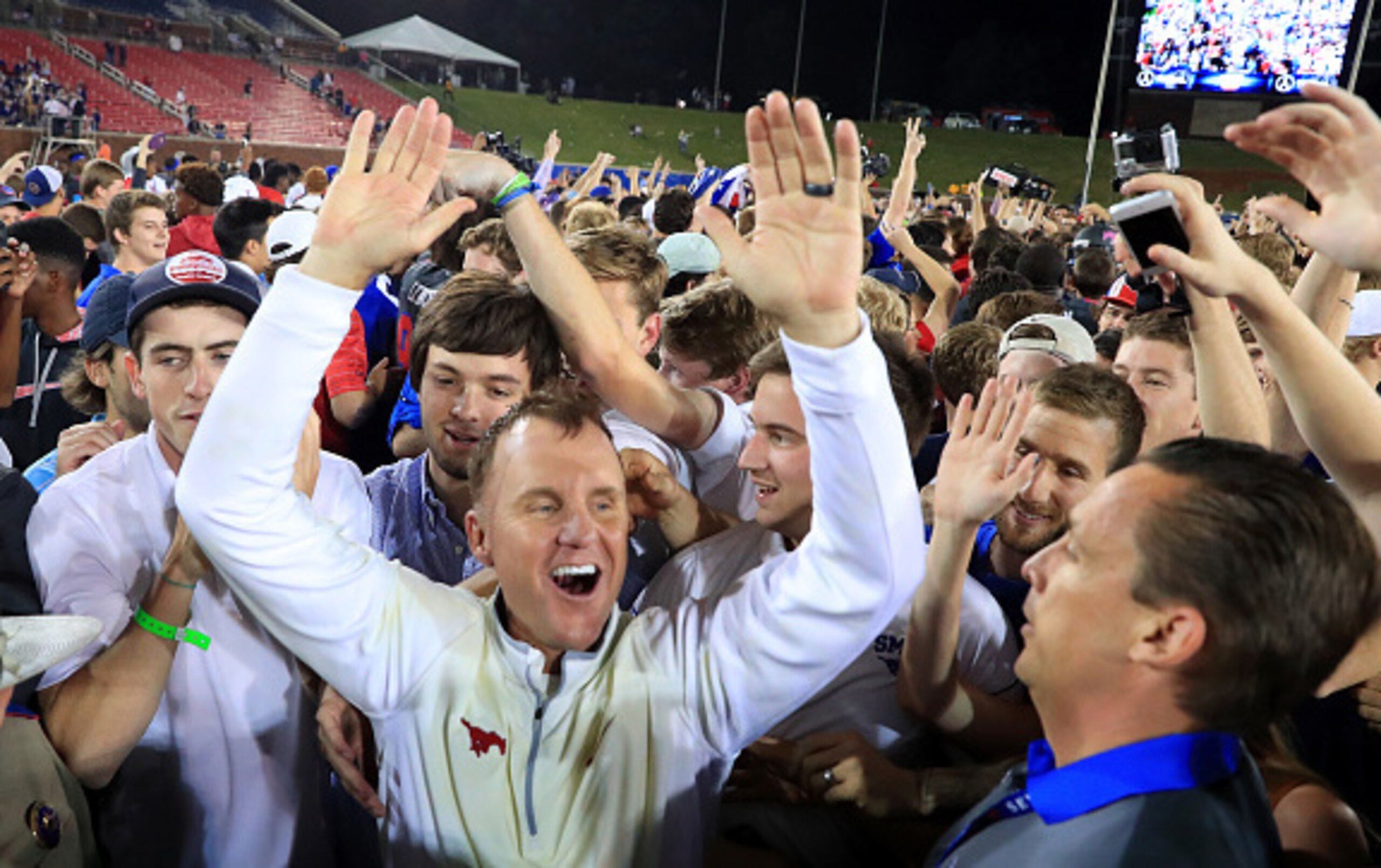 Head coach Chad Morris, here celebrating after upsetting Houston last year, appears to have SMU football heading in the right direction.