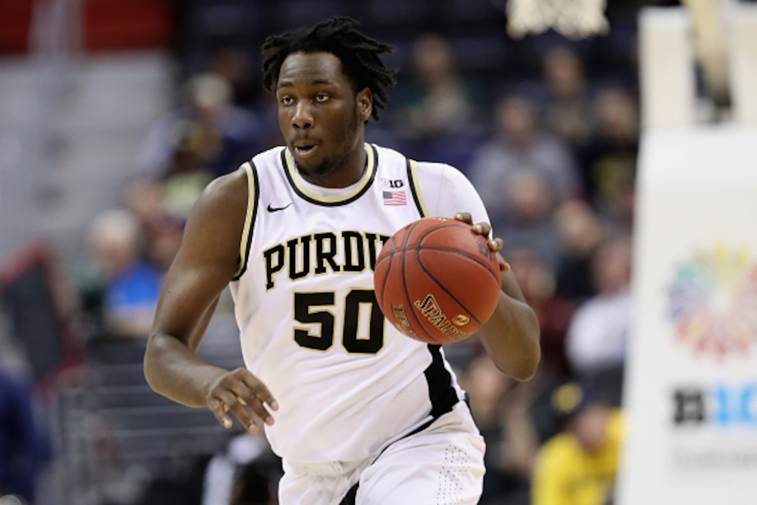 WASHINGTON, DC - MARCH 10: Caleb Swanigan #50 of the Purdue Boilermakers dribbles the ball against the Michigan Wolverines during the Big Ten Basketball Tournament at Verizon Center on March 10, 2017 in Washington, DC.  (Photo by Rob Carr/Getty Images)