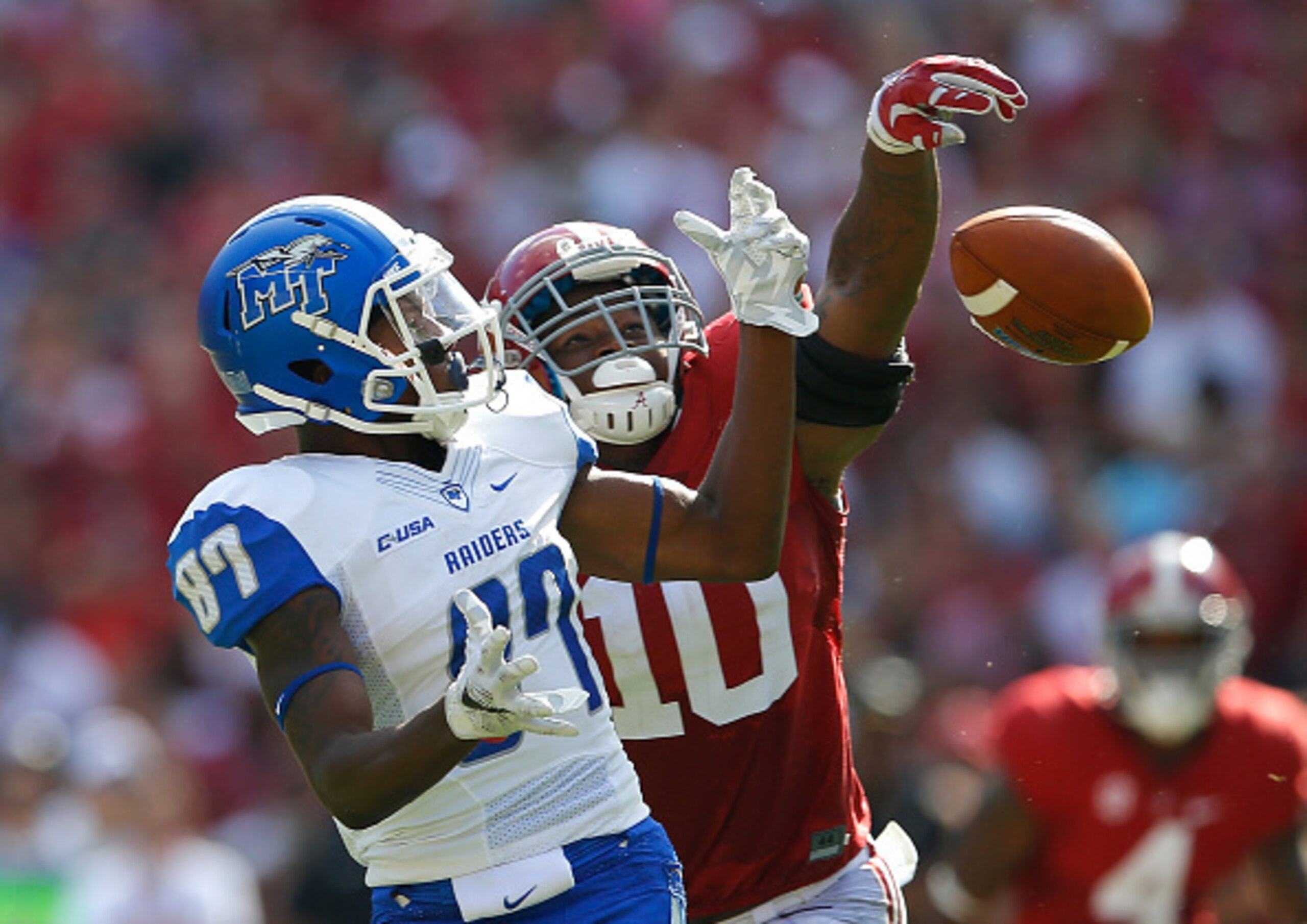 TUSCALOOSA, AL - SEPTEMBER 12:  Richie James #87 of the Middle Tennessee Blue Raiders fails to pull in this reception against Reuben Foster #10 of the Alabama Crimson Tide at Bryant-Denny Stadium on September 12, 2015 in Tuscaloosa, Alabama.  (Photo by Ke