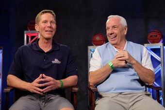 Will Gonzaga's Mark Few (left) or UNC's Roy Williams (right) still be smiling after Monday's title game?