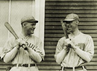 Rogers Hornsby (left) won seven batting titles and two Triple Crowns.