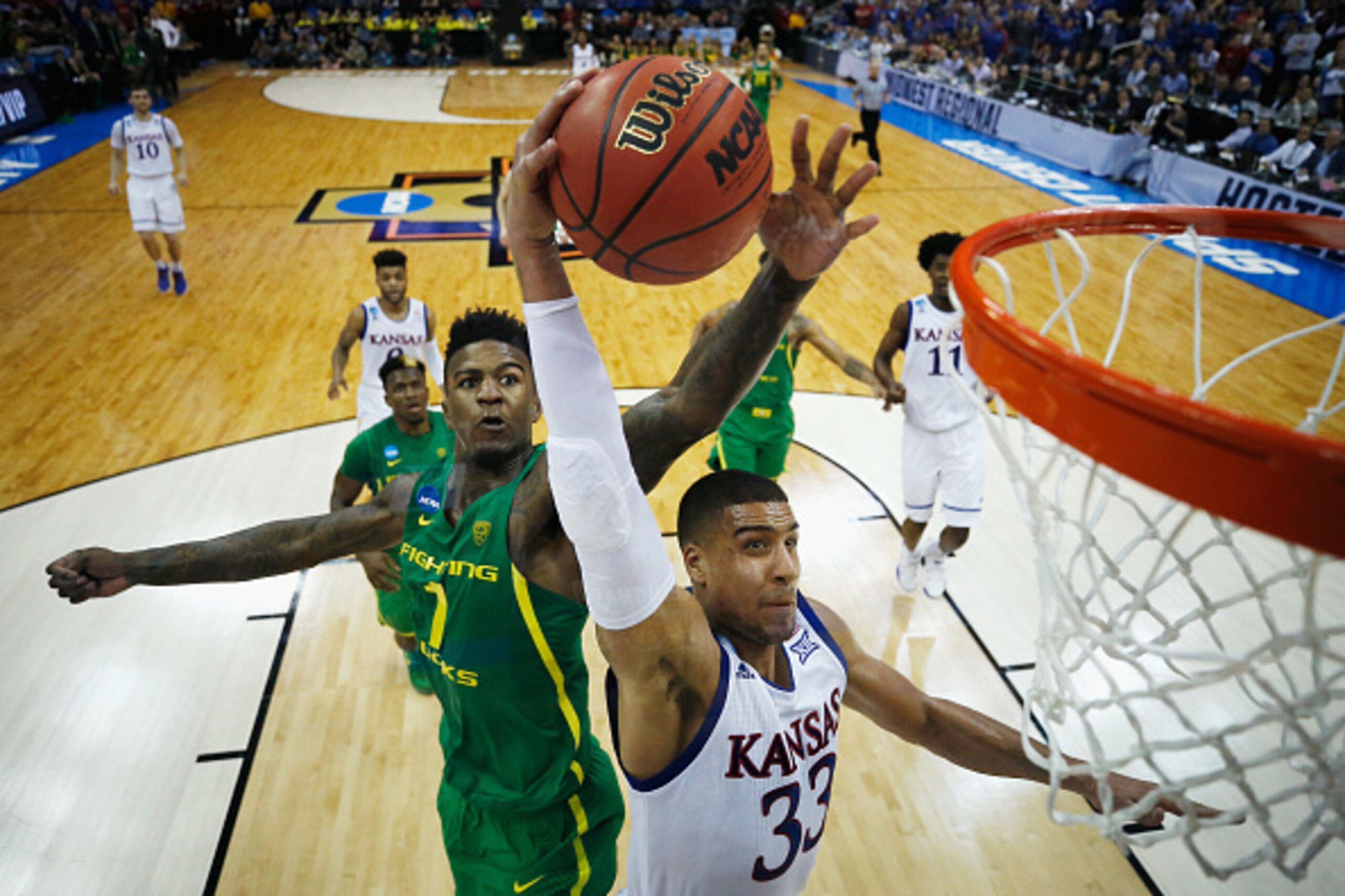 Landen Lucas thought he had a breakaway dunk, but Jordan Bell had other ideas. Landen Lucas thought he had a breakaway dunk, but Jordan Bell had other ideas.