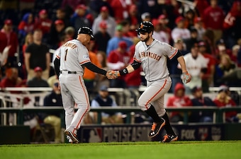 Brandon Belt ended the longest game in postseason history with an 18th-inning home run.