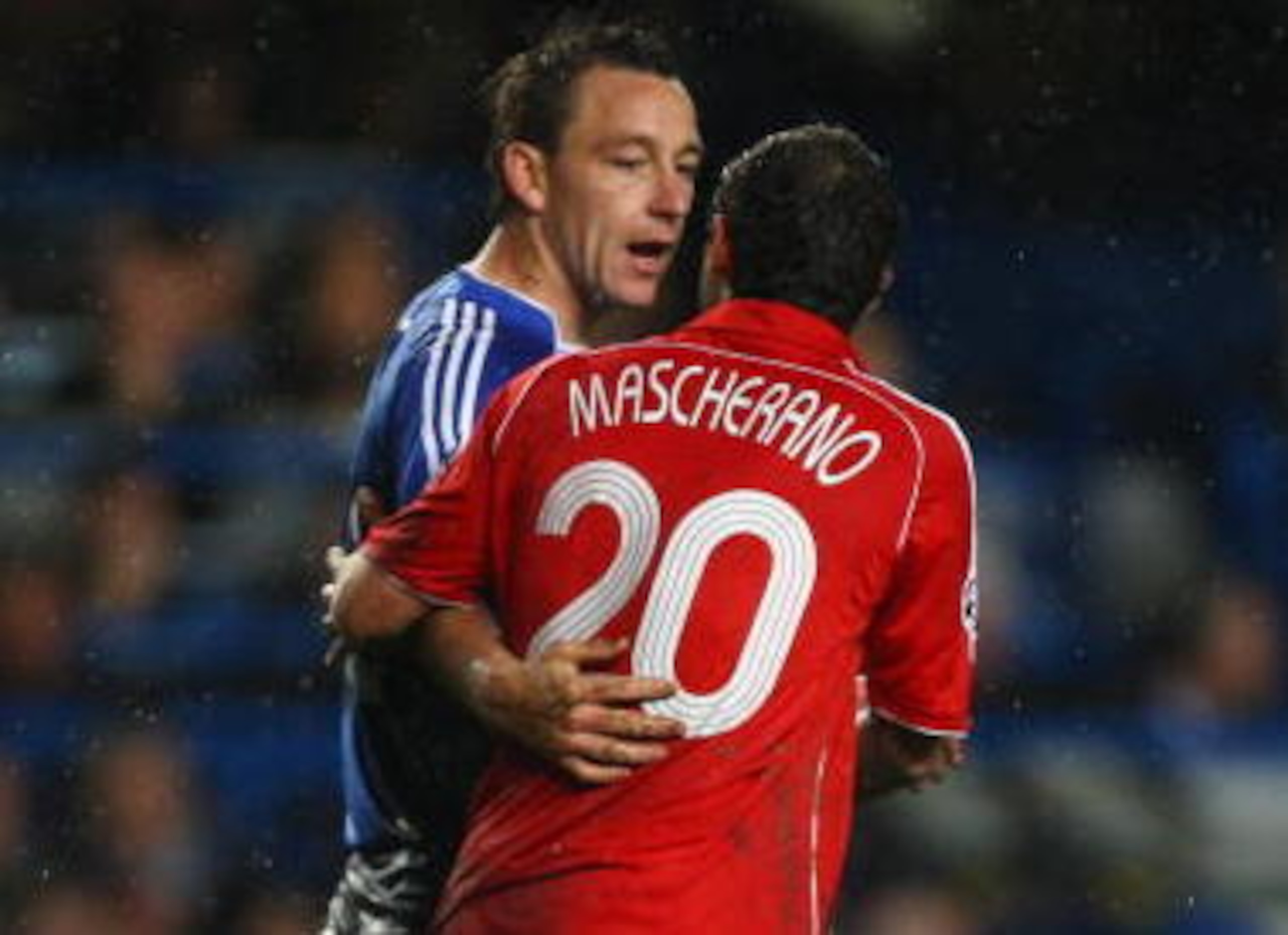 Javier Mascherano has a friendly enough chat with Chelsea's John Terry.