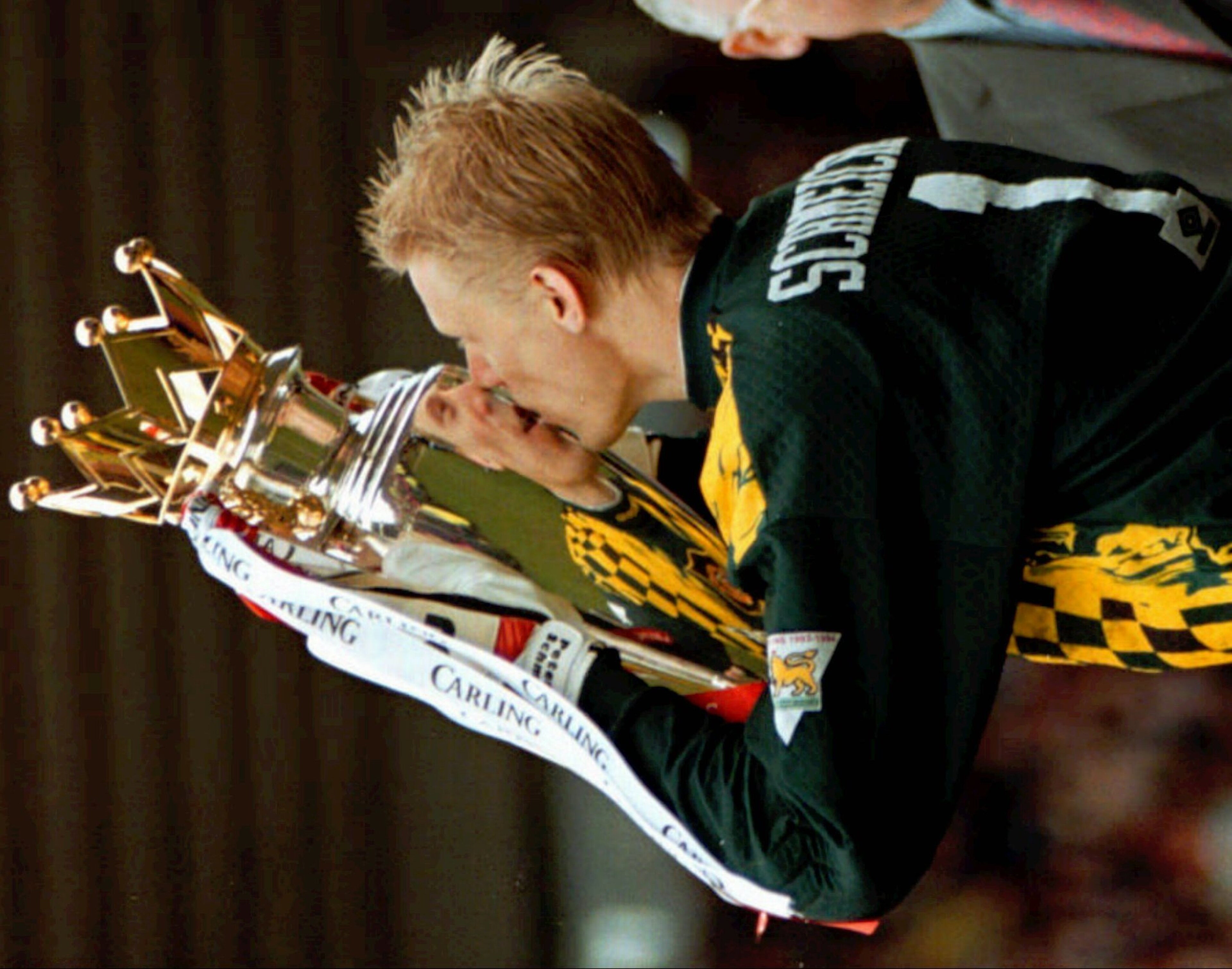 Peter Schmeichel with the Premier League trophy in 1996. Peter Schmeichel with the Premier League trophy in 1996.