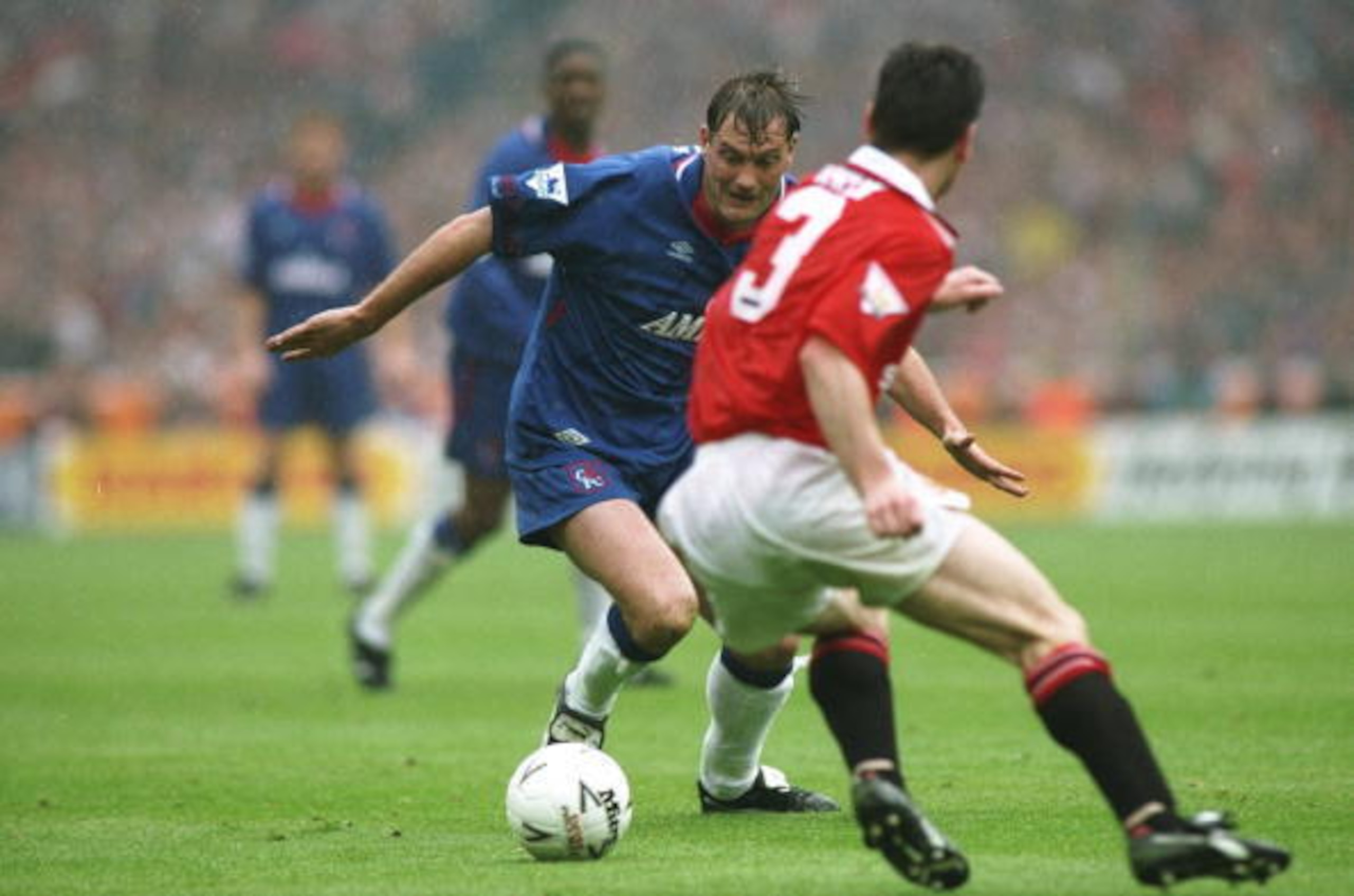 Irwin faces up against Glenn Hoddle in the 1994 FA Cup final.