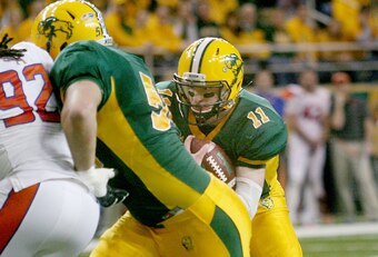 P.J. Hall shedding a blocker in pursuit of Carson Wentz.