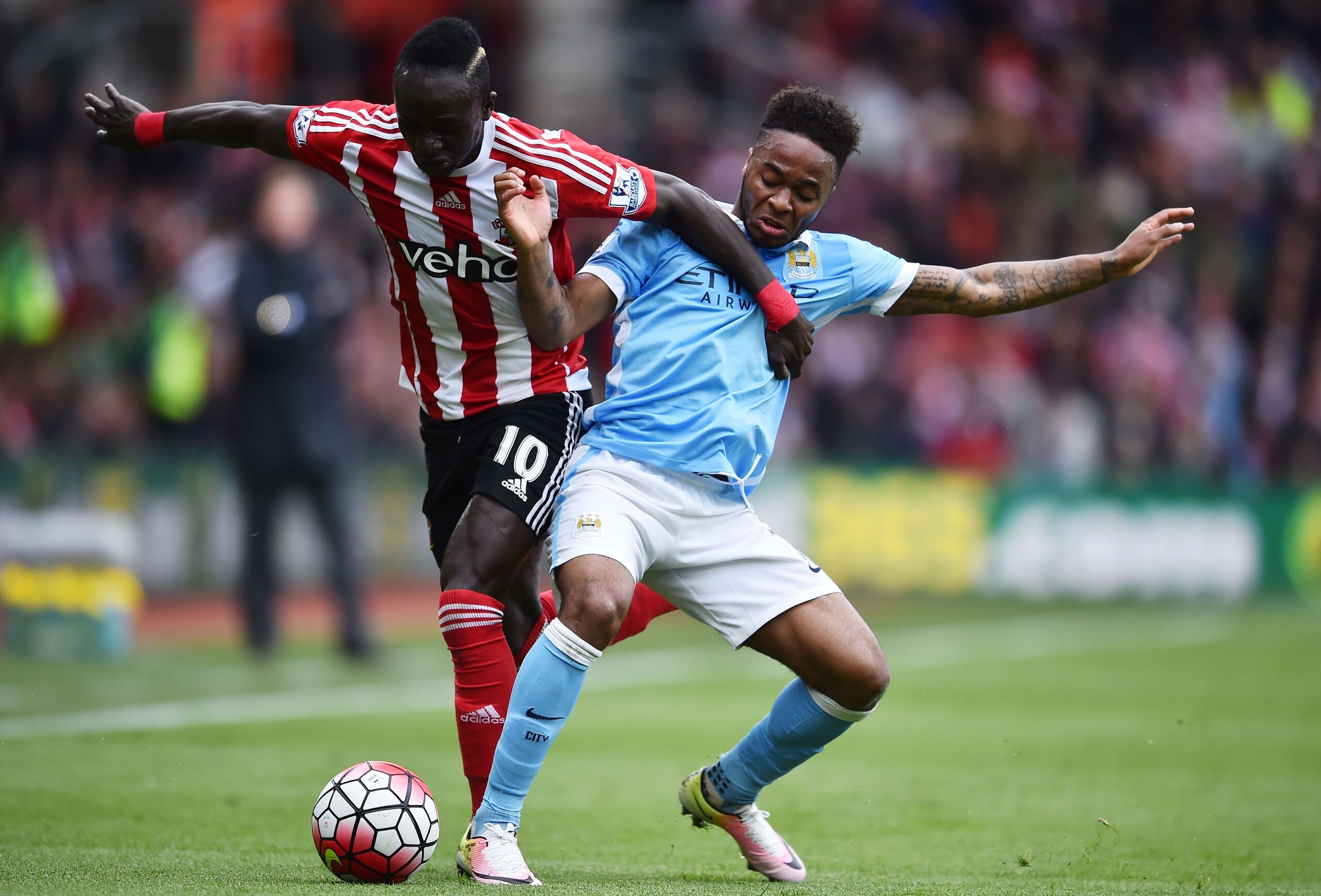 Sadio Mane and Raheem Sterling fight it out to start on the right wing.