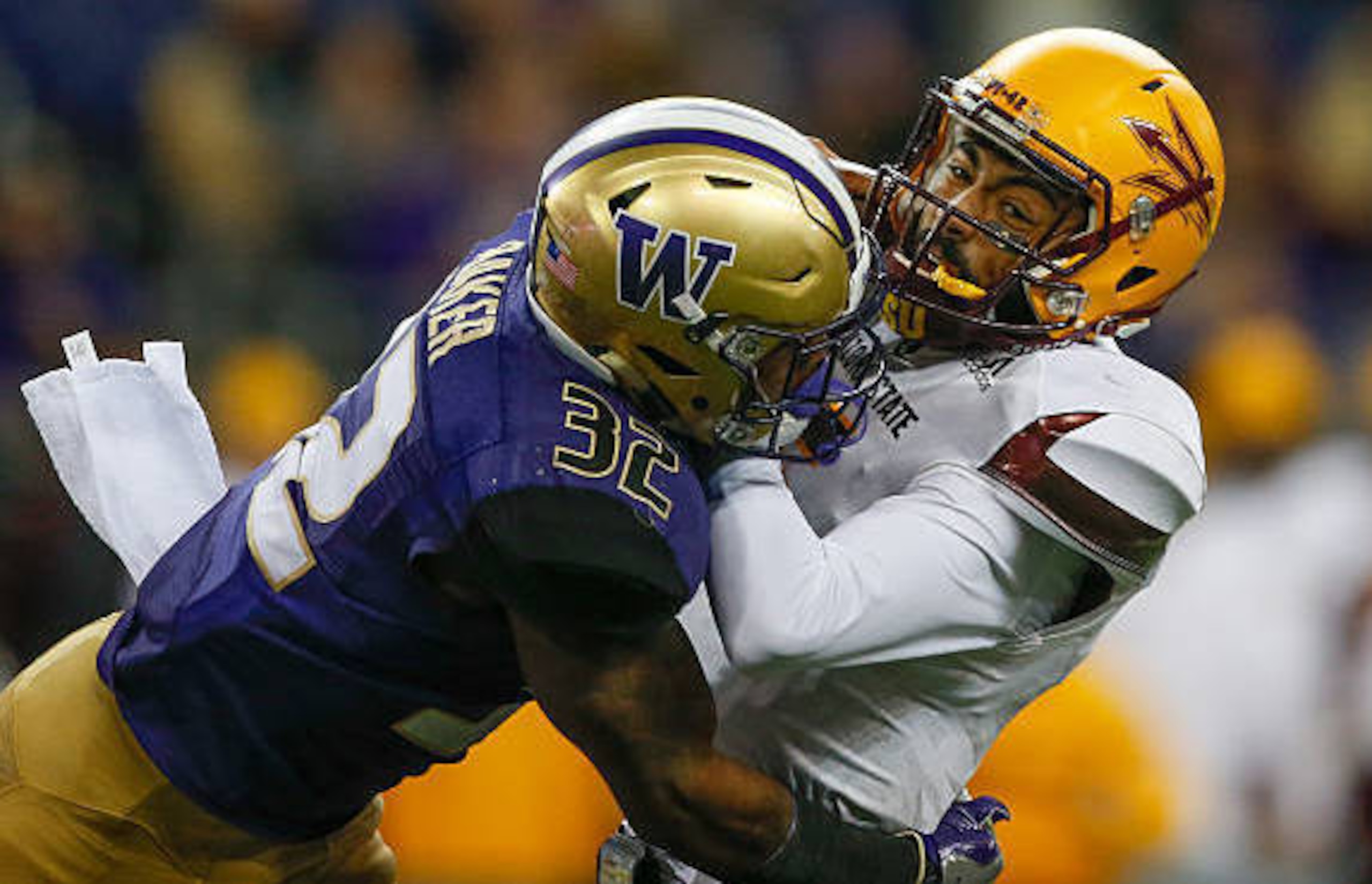 Would the Patriots trade up in the draft for a guy like Washington's Budda Baker?