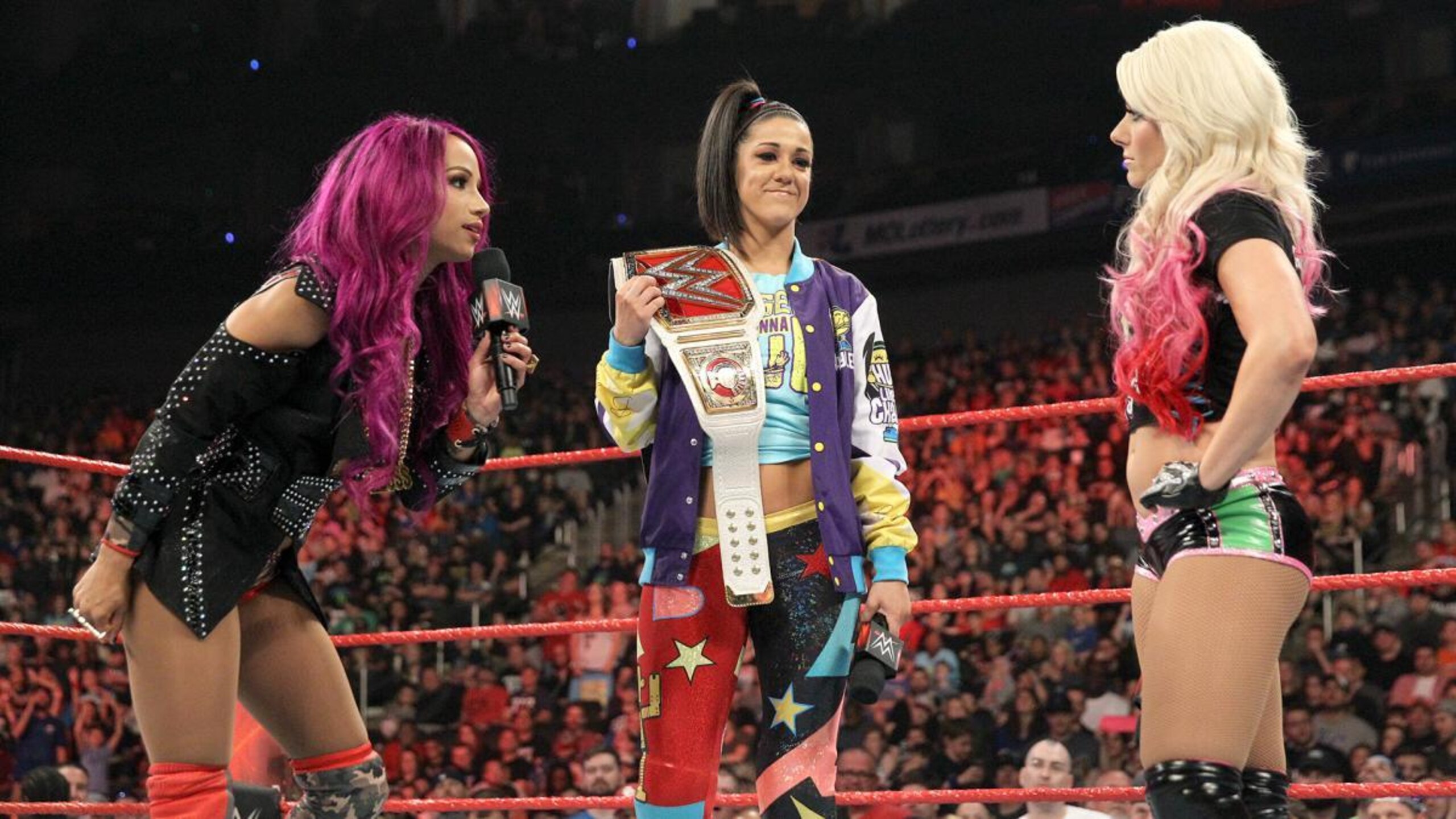 Sasha Banks and Bayley confront Alexa Bliss. Sasha Banks and Bayley confront Alexa Bliss.