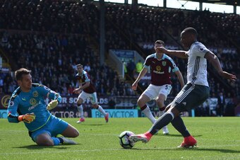A current Red scores past an ex-Red as Anthony Martial slips one past Tom Heaton.