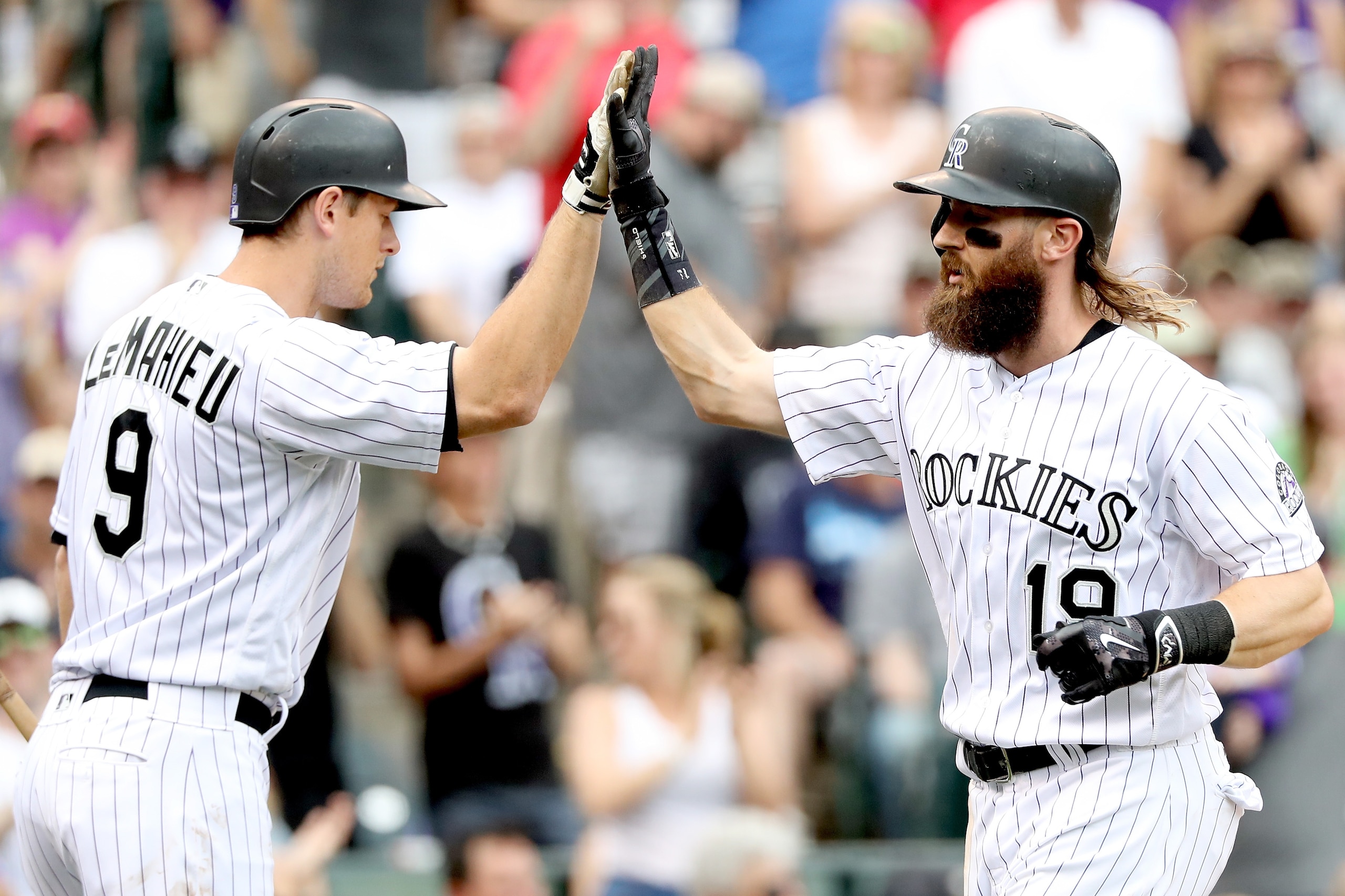 Colorado Rockies second baseman DJ Lemahieu and outfielder Charlie Blackmon.