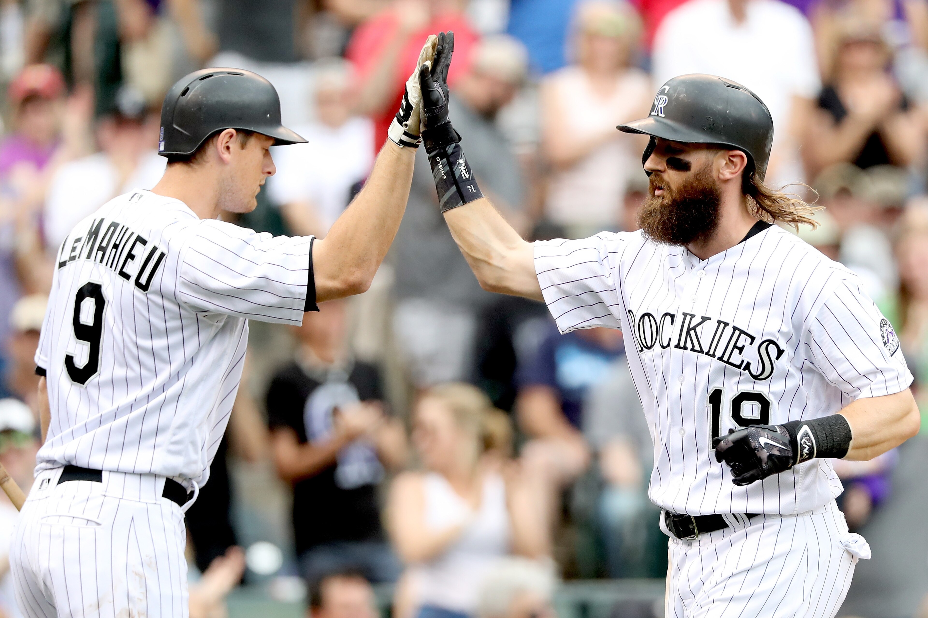 Colorado Rockies second baseman DJ Lemahieu and outfielder Charlie Blackmon.
