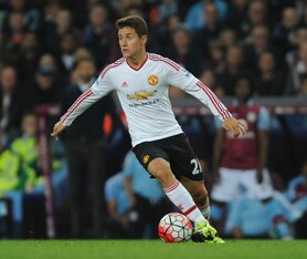 Ander Herrera models United's simple, classic away kit in 2015/16.