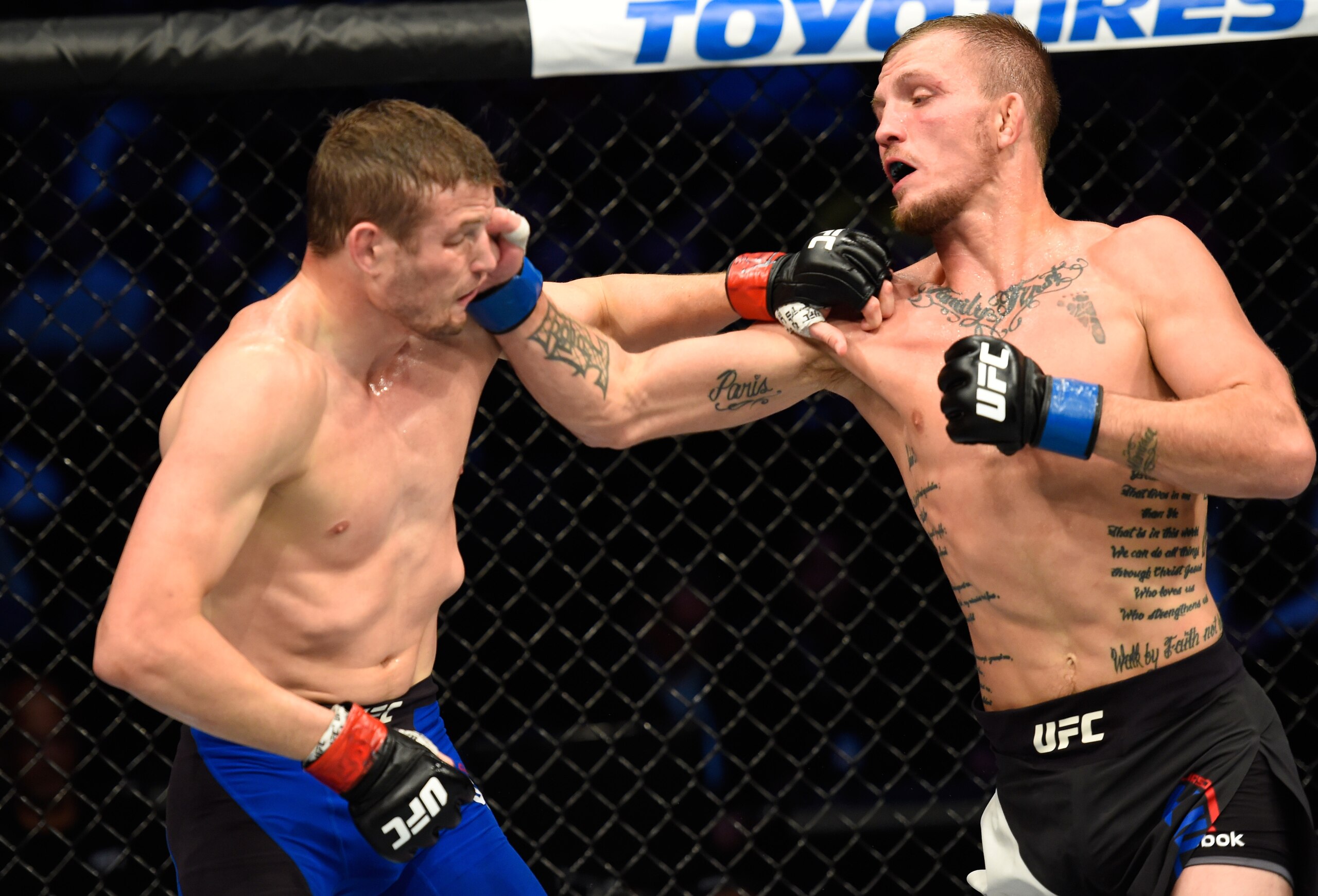 Jason Knight (right) hits Chas Skelly