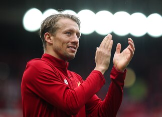 Lucas salutes the Anfield crowd on the final day of the season.