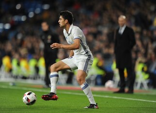 Enzo Fernandez, watched on by manager and father Zinedine Zidane.