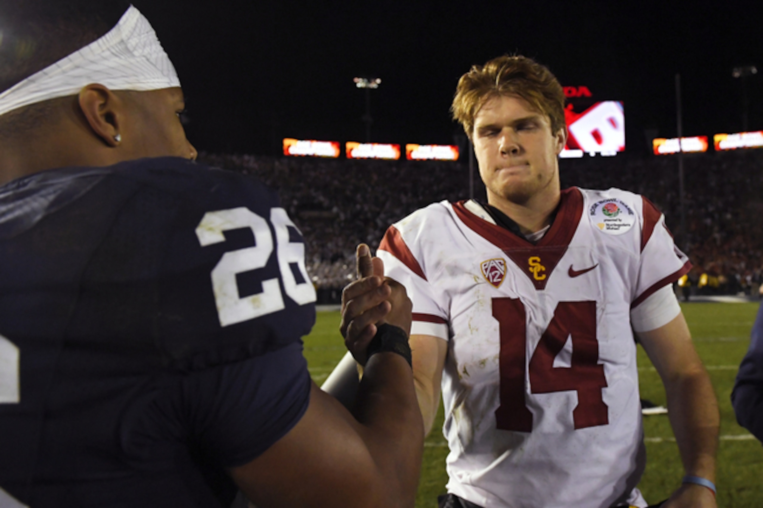 Saquon Barkley (26) and Sam Darnold (14)