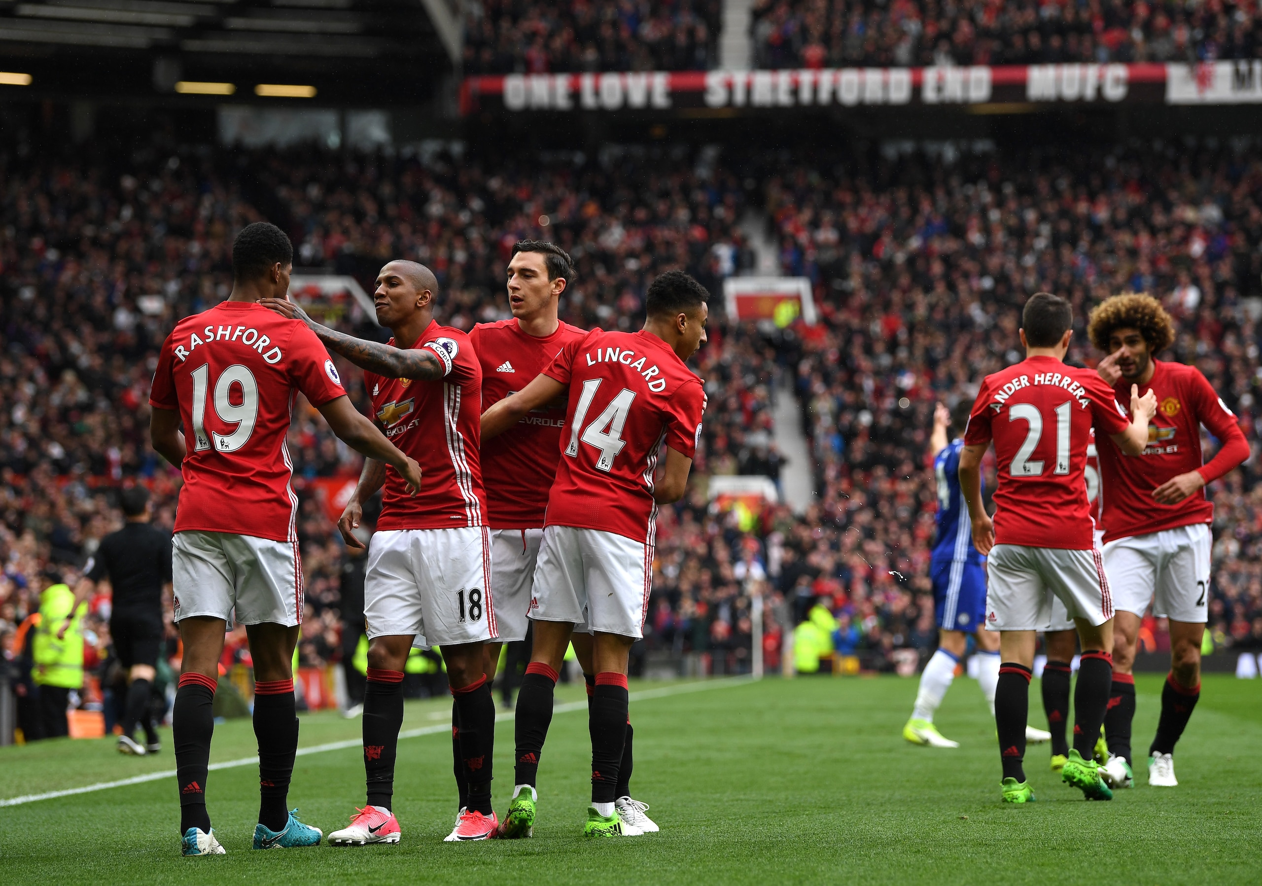United celebrate their opening goal against Chelsea at Old Trafford.