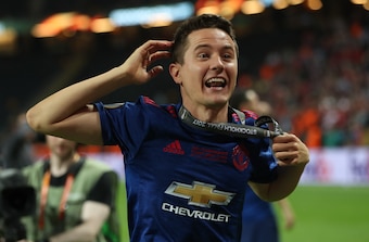 Herrera celebrates after United's victory in Stockholm.