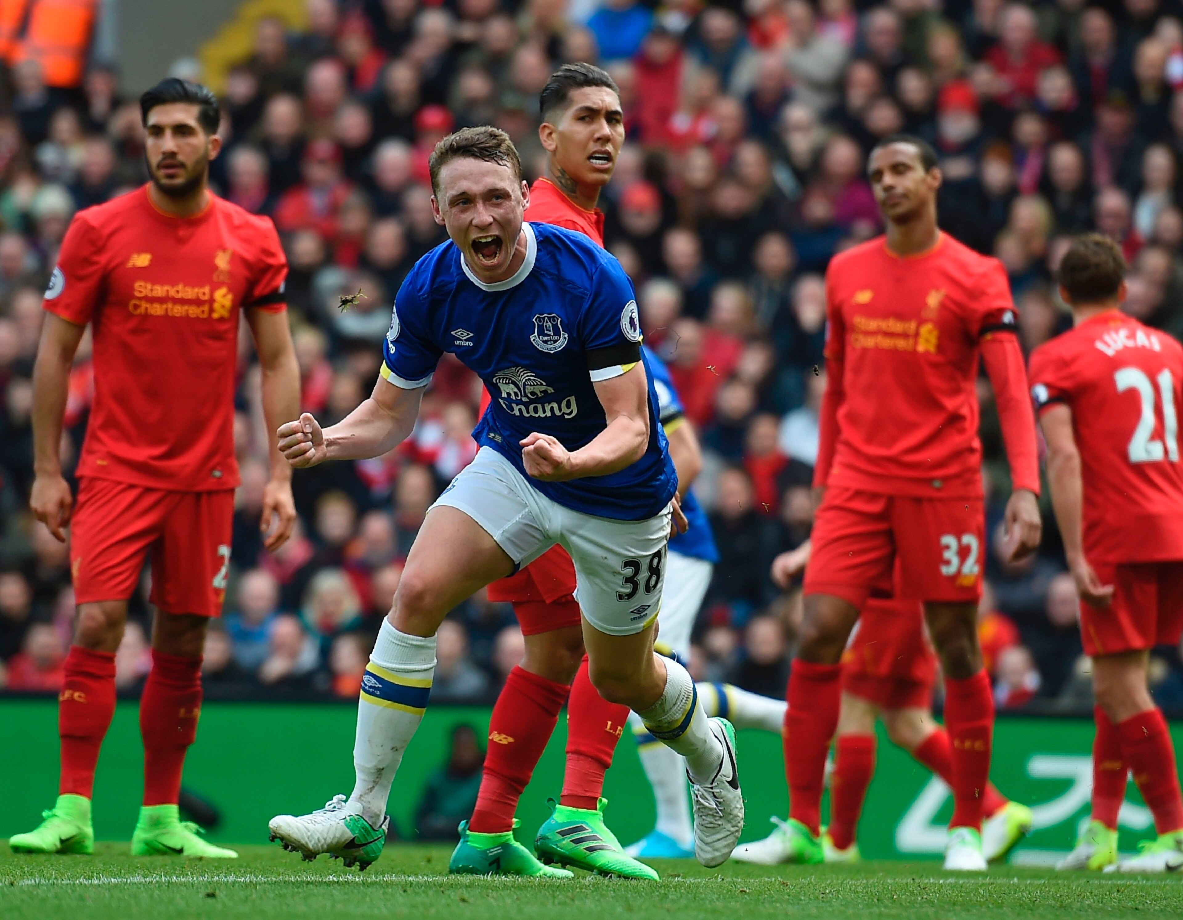 Matthew Pennington celebrates scoring for Everton at Anfield.