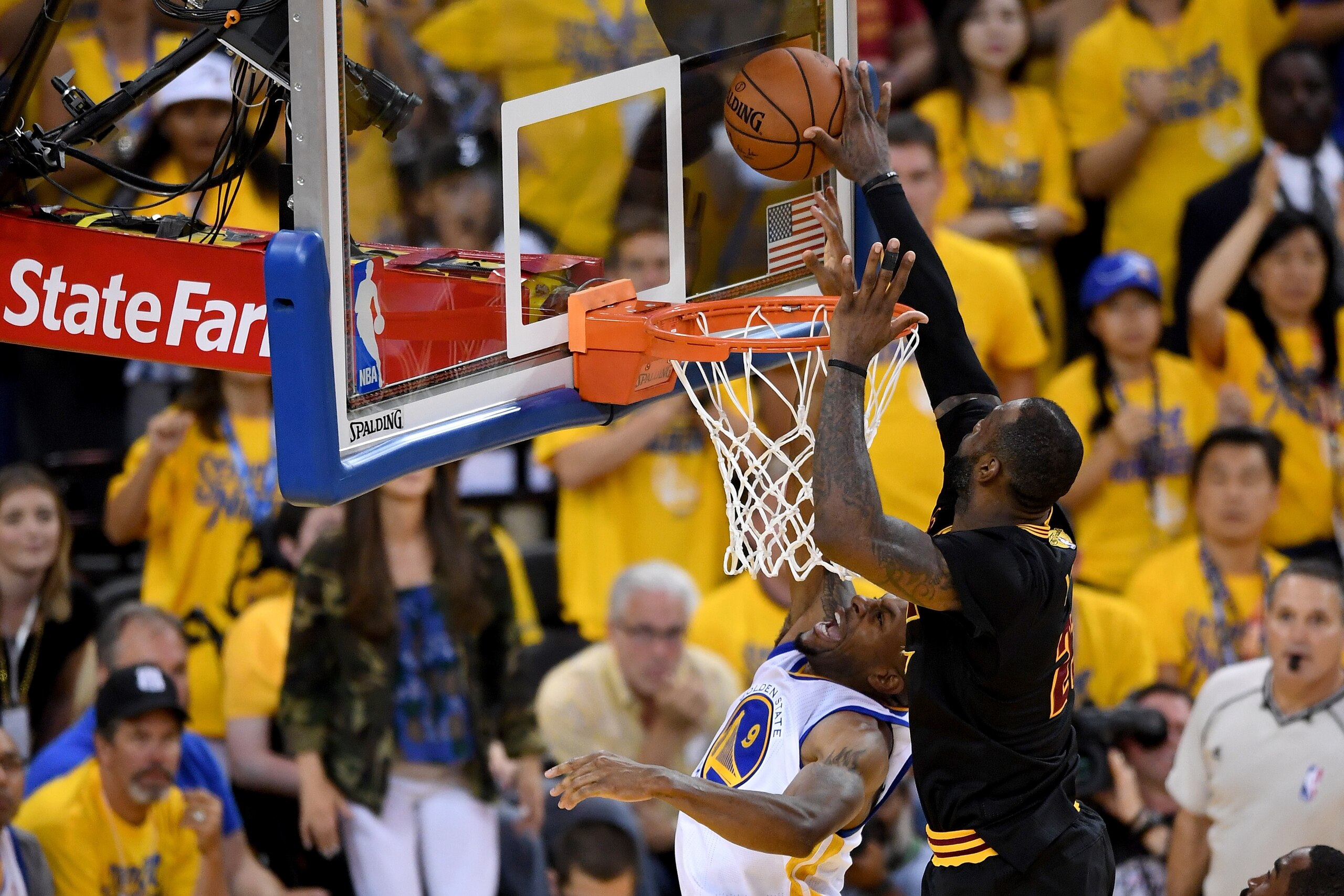 OAKLAND, CA - JUNE 19:  LeBron James #23 of the Cleveland Cavaliers blocks a shot by Andre Iguodala #9 of the Golden State Warriors in Game 7 of the 2016 NBA Finals at ORACLE Arena on June 19, 2016 in Oakland, California. NOTE TO USER: User expressly ackn