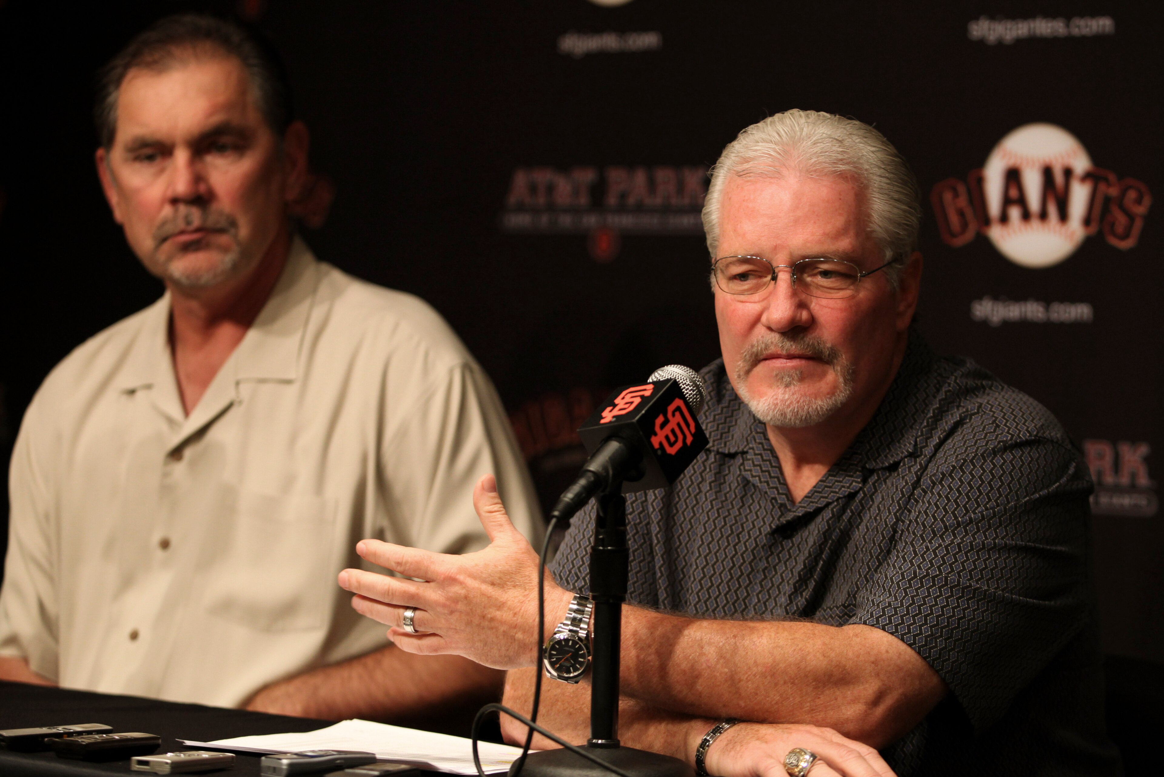 San Francisco Giants general manager Brian Sabean, right, gestures beside manager Bruce Bochy during a news conference Thursday, Sept. 29, 2011, in San Francisco. The reigning World Series champions are headed home early this year after high hopes of anot San Francisco Giants general manager Brian Sabean, right, gestures beside manager Bruce Bochy during a news conference Thursday, Sept. 29, 2011, in San Francisco. The reigning World Series champions are headed home early this year after high hopes of anot