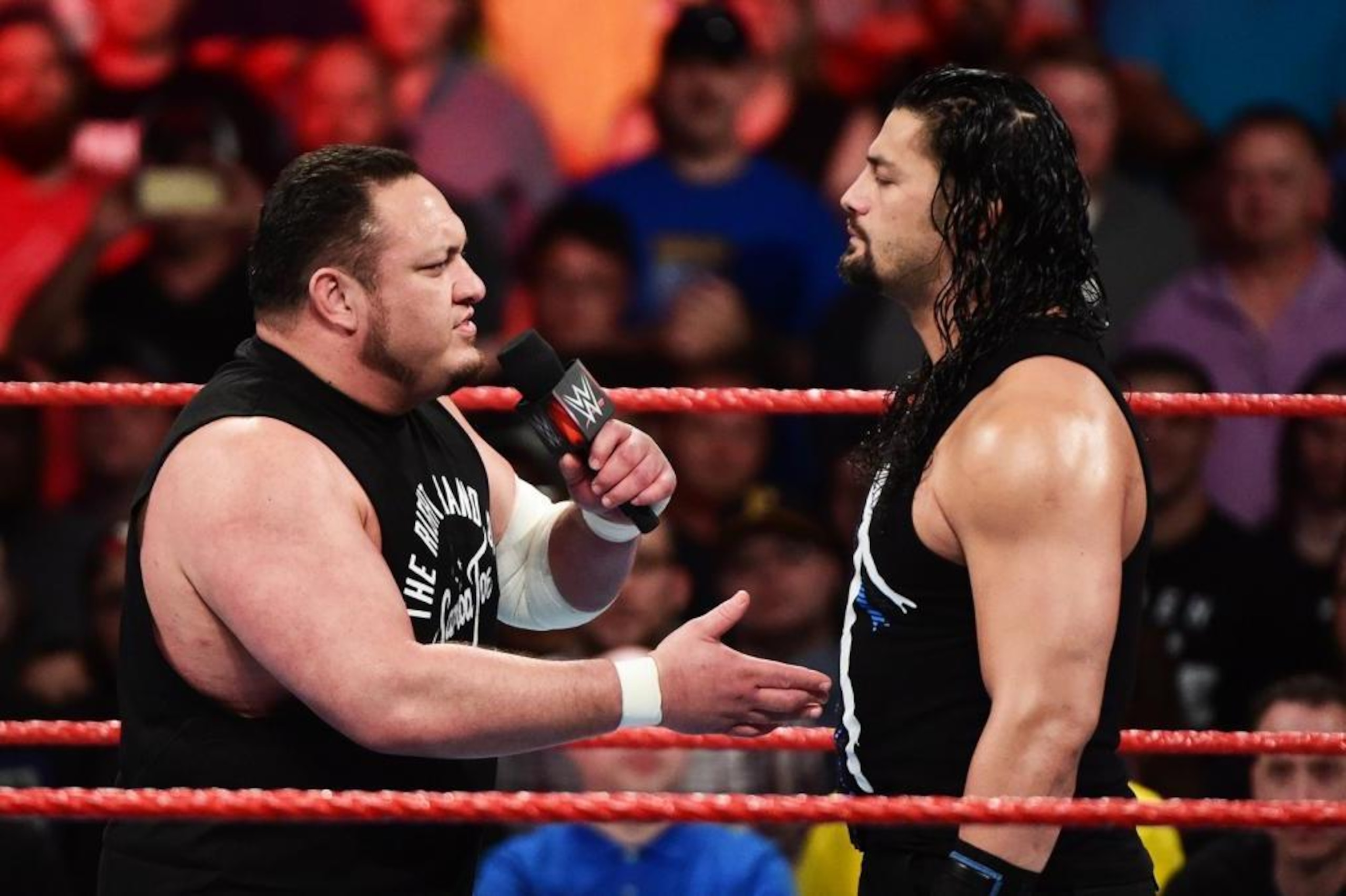 Samoa Joe reintroduces himself to Roman Reigns.