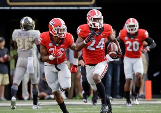 Dominick Sanders returns a pick-six against Vanderbilt in 2015.