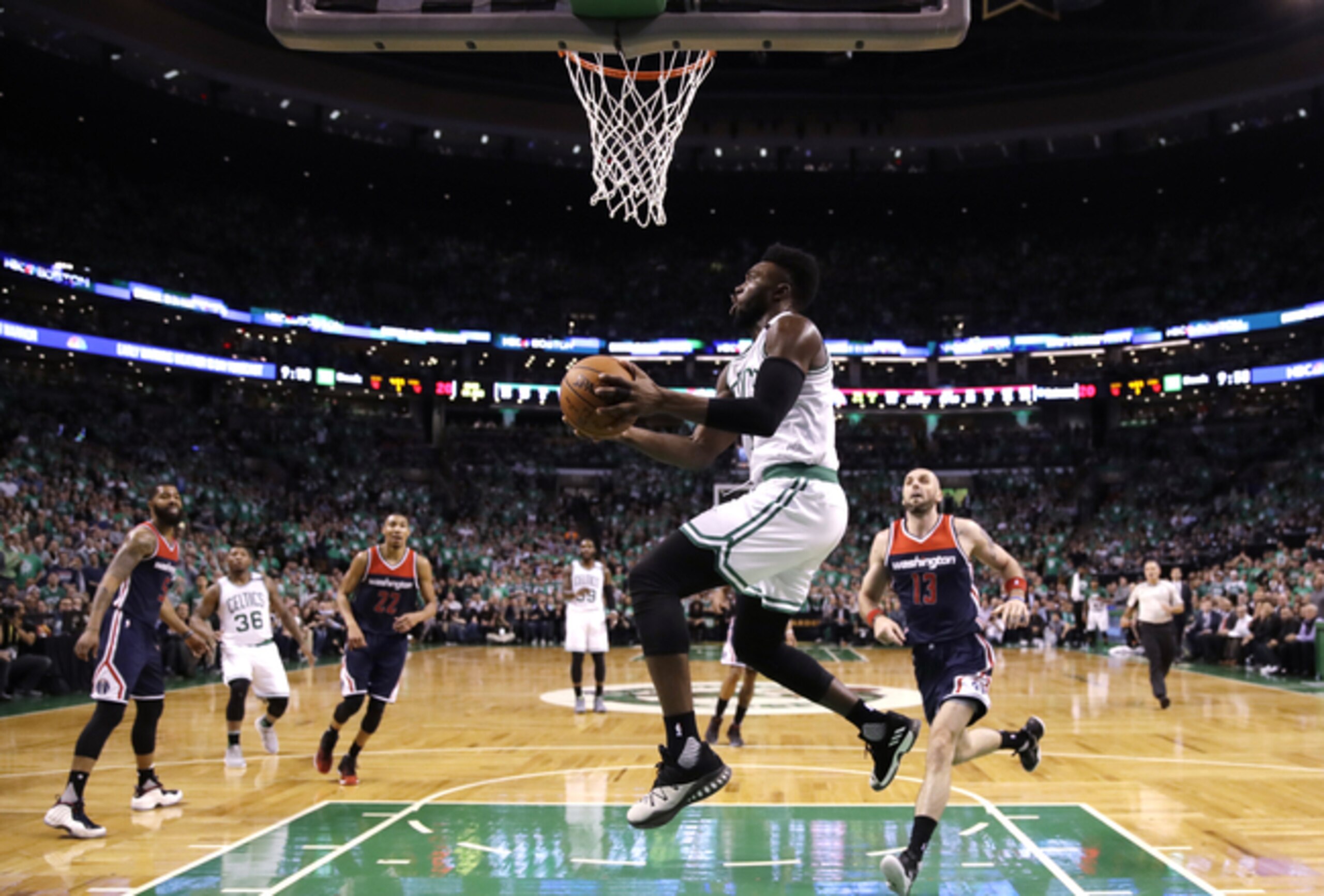 Boston's Jalen Brown (C) flies in for the reverse layup. Boston's Jalen Brown (C) flies in for the reverse layup.