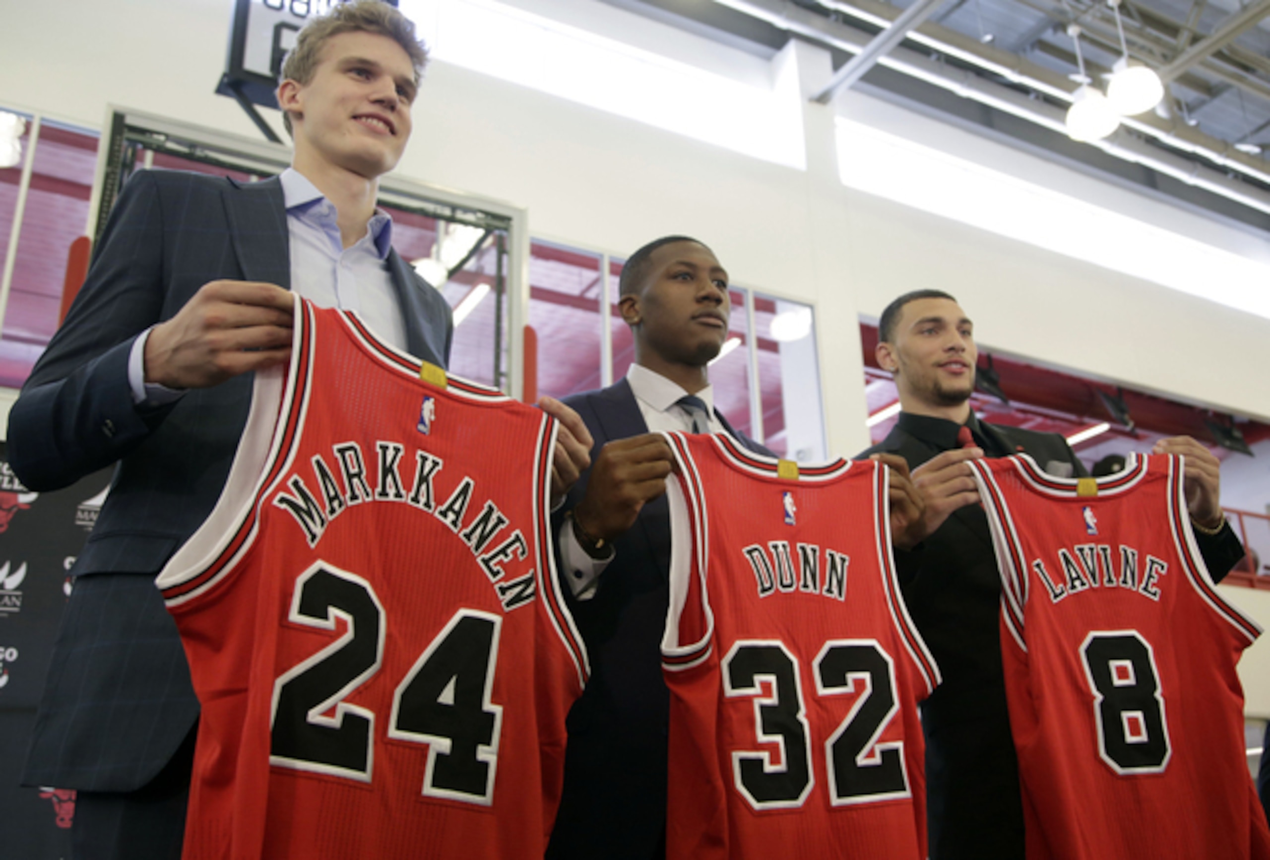 Lauri Markkanen (24), Kris Dunn (32) and Zach LaVine (8) at their introductory press conference in Chicago. Lauri Markkanen (24), Kris Dunn (32) and Zach LaVine (8) at their introductory press conference in Chicago.