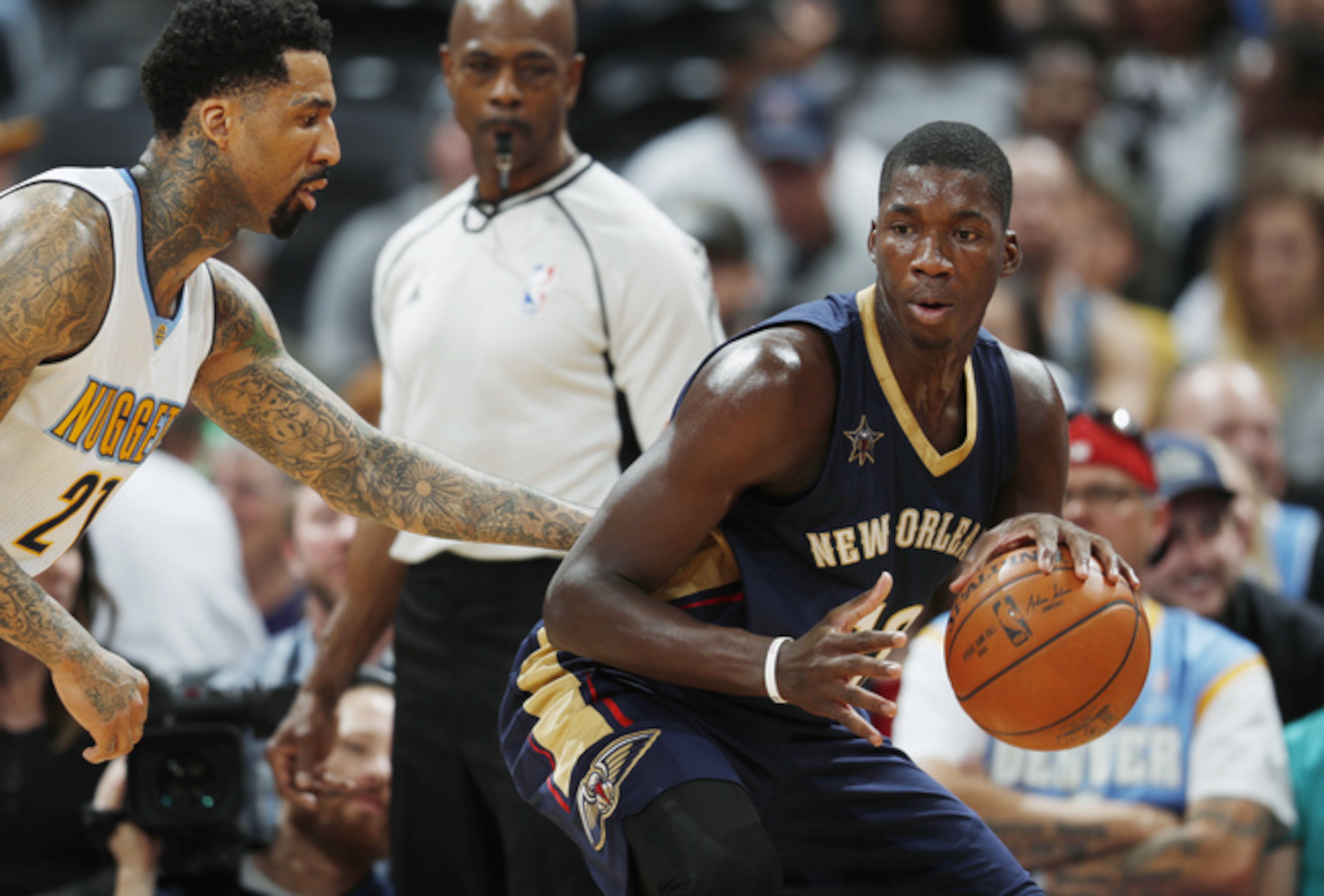 New Orleans' Cheick Diallo (R) goes to work against Denver's Wilson Chandler.