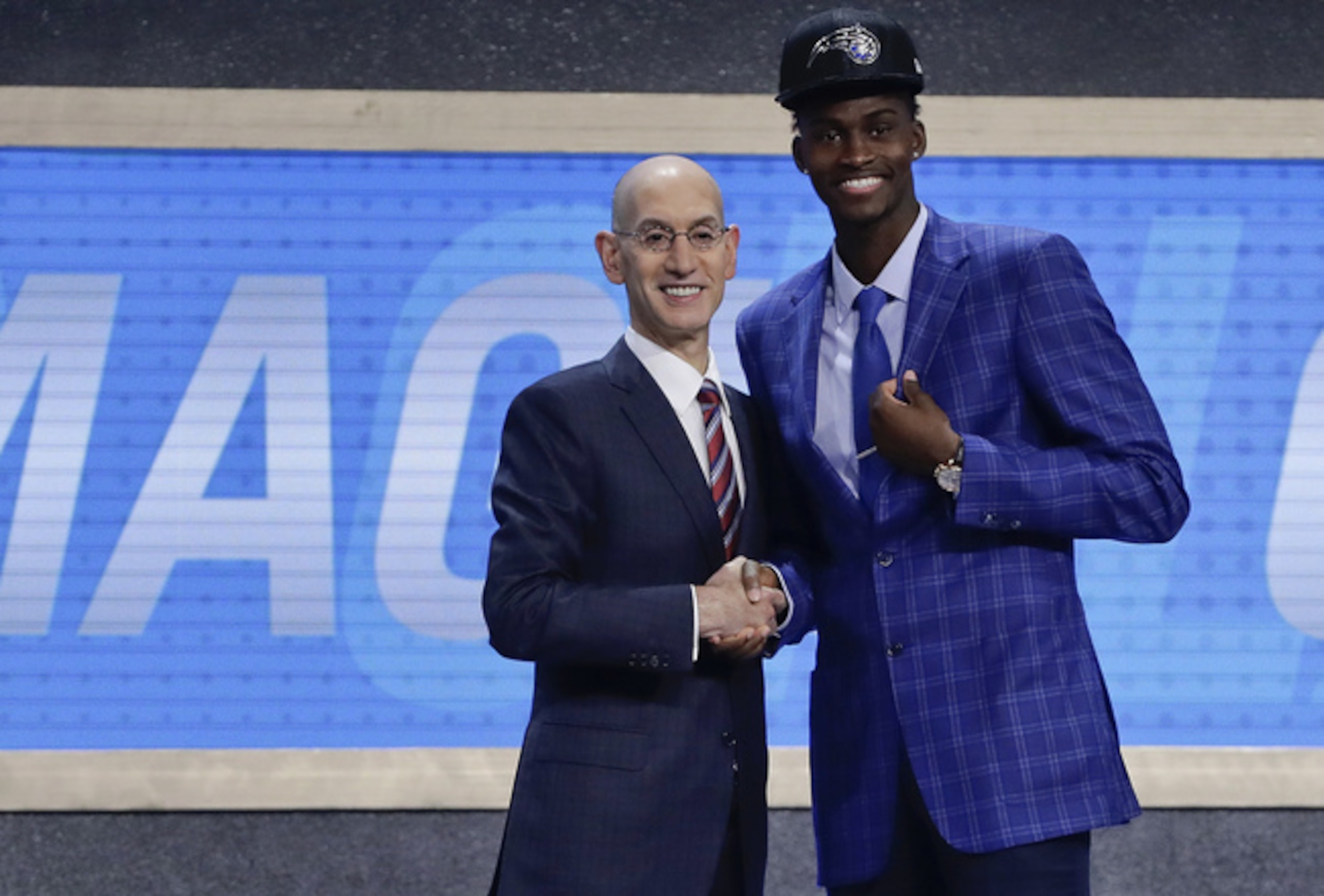 Magic draftee Jonathan Isaac (R) poses with NBA commissioner Adam Silver at the 2017 draft. Magic draftee Jonathan Isaac (R) poses with NBA commissioner Adam Silver at the 2017 draft.
