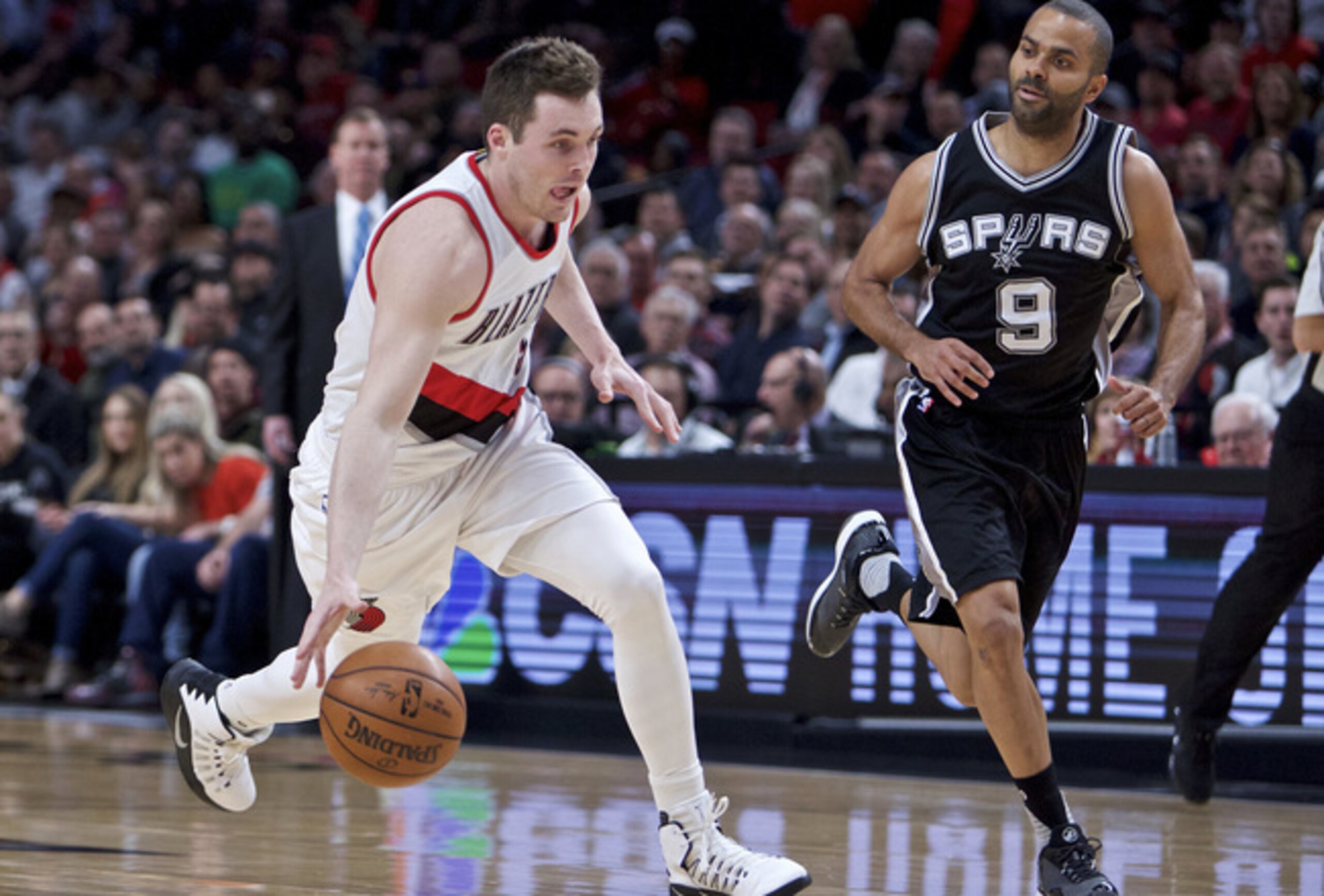 Portland's Pat Connaughton dribbles past San Antonio's Tony Parker. Portland's Pat Connaughton dribbles past San Antonio's Tony Parker.