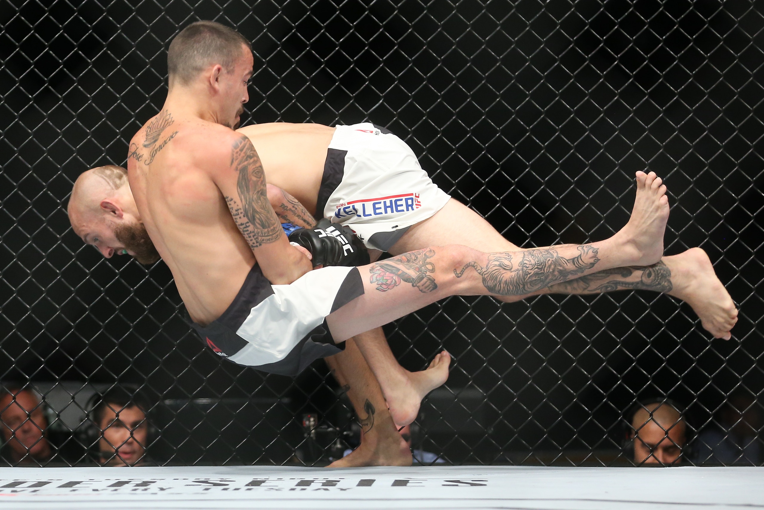Brian Keller (left) goes for a takedown, but Marlon Vera keeps hold on Kelleher's arm, which he used to get a submission win. Brian Keller (left) goes for a takedown, but Marlon Vera keeps hold on Kelleher's arm, which he used to get a submission win.