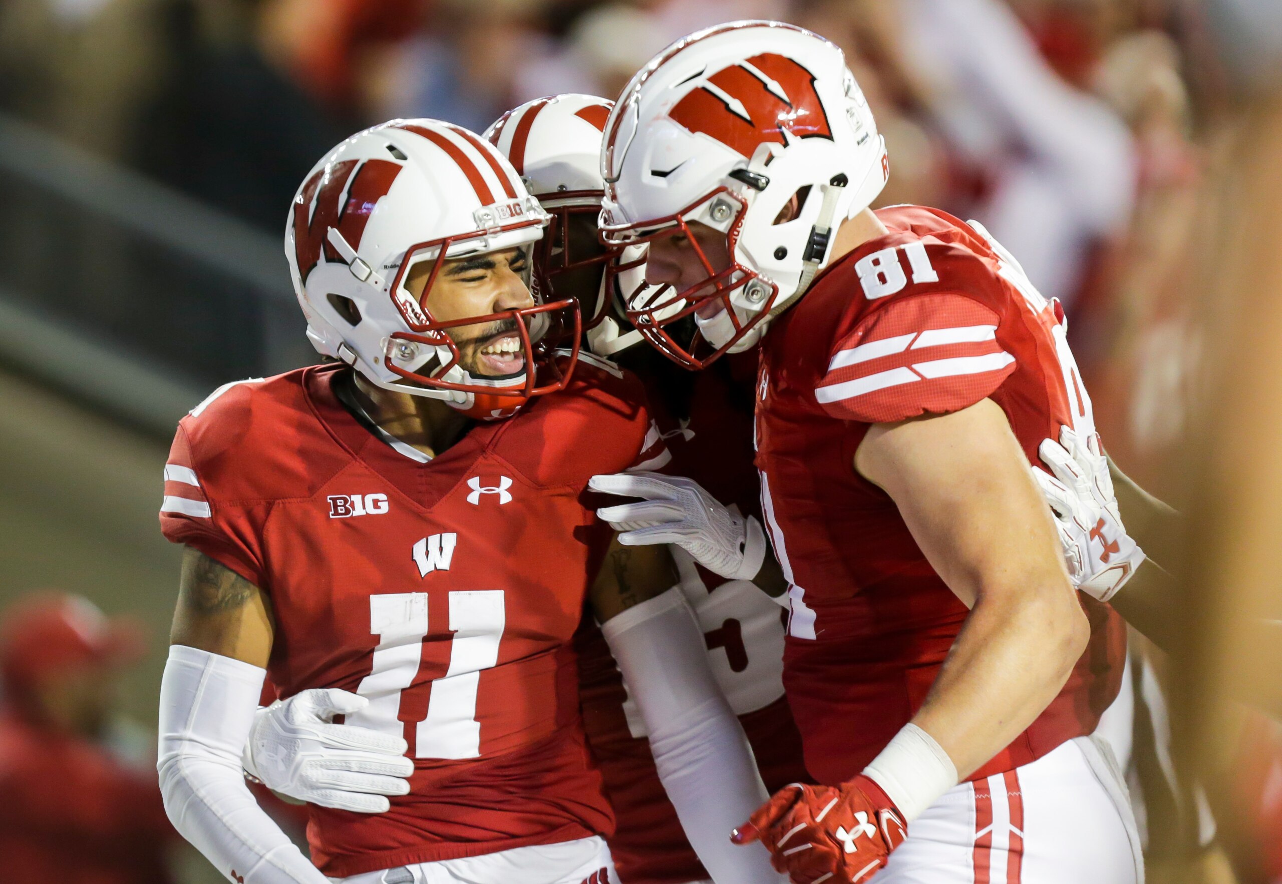 Jazz Peavy (11) and Troy Fumagalli (81)