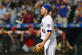 The Mets received three prospects, all relief pitchers, for Addison Reed.