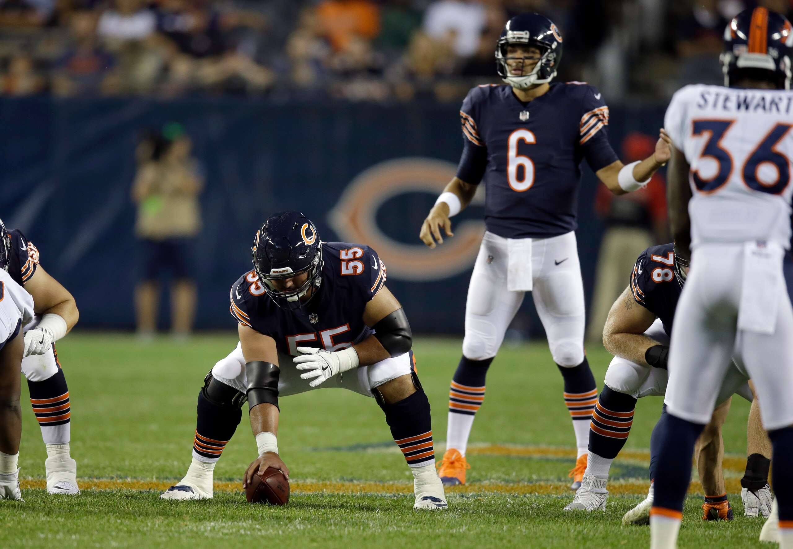 Chicago Bears center Hroniss Grasu (55) during the first half of an NFL preseason football game against the Denver Broncos, Thursday, Aug. 10, 2017, in Chicago. (AP Photo/G-Jun Yam)