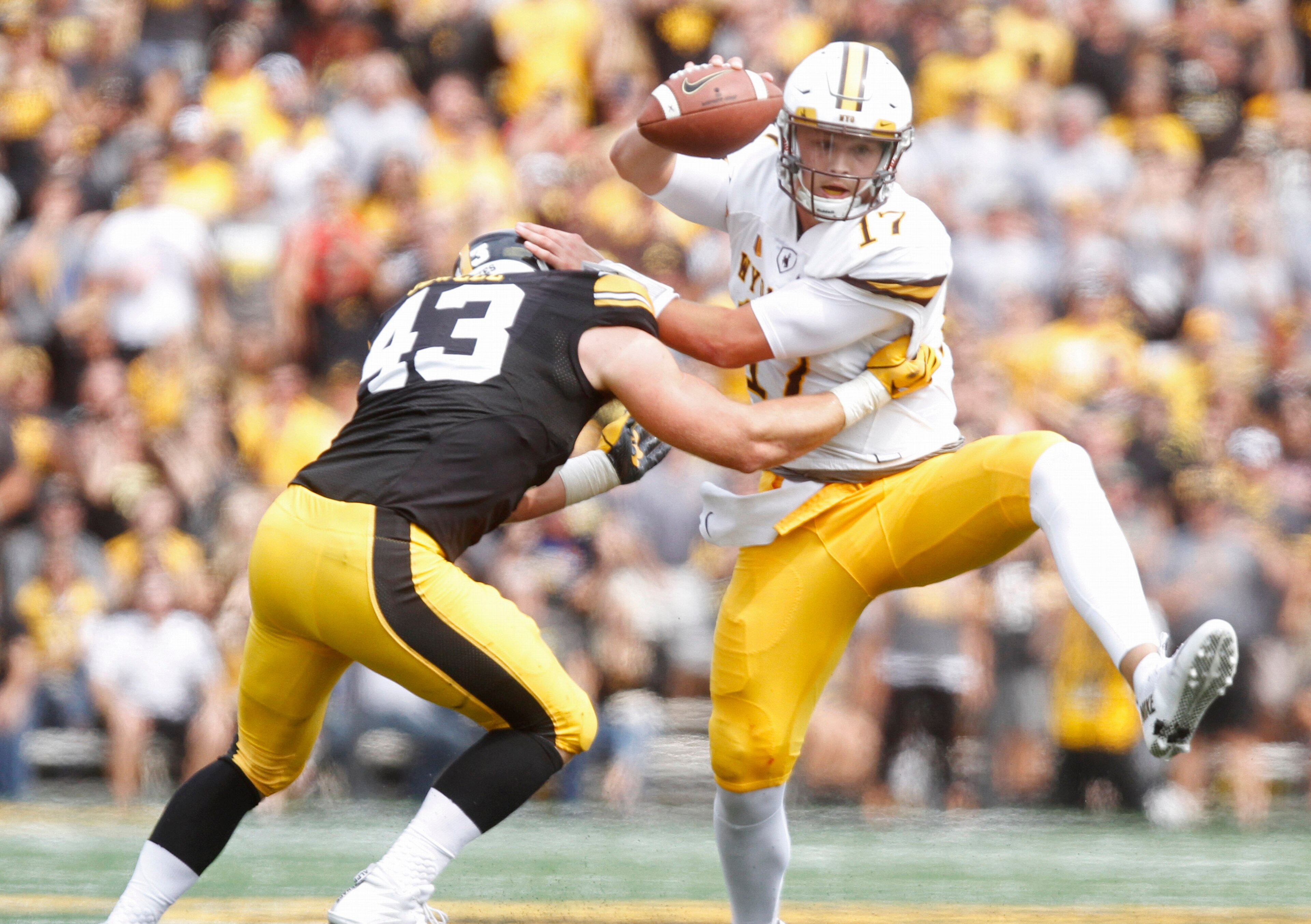 Josh Allen spent most of his 2017 debut trying to avoid Iowa defenders. Josh Allen spent most of his 2017 debut trying to avoid Iowa defenders.
